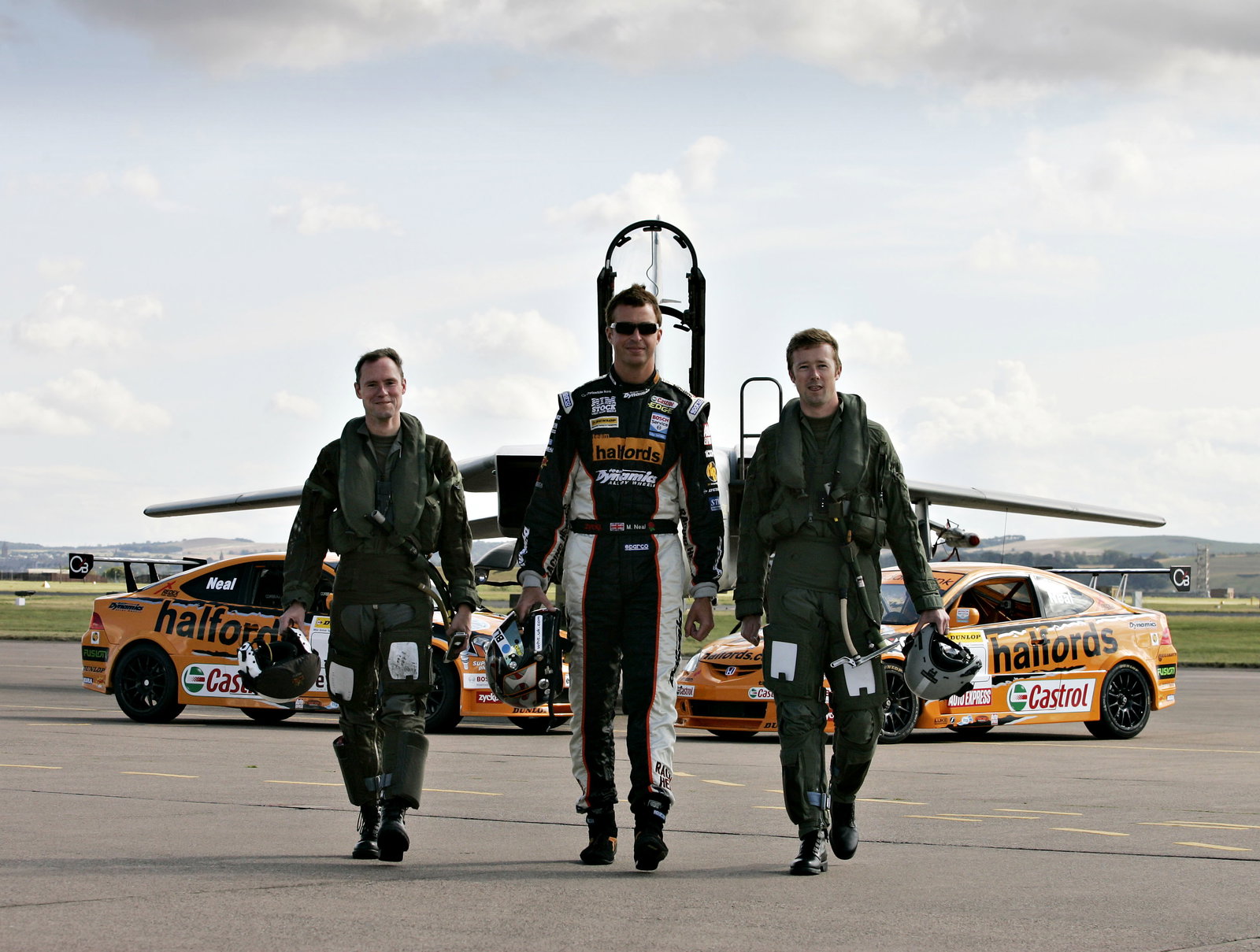 MATT NEAL RACES A RAF TORNADO JET AT LEUCHARS AIR BASE IN FIFE TODAY CO PILOTED BY HIS TEAM MATE GOR