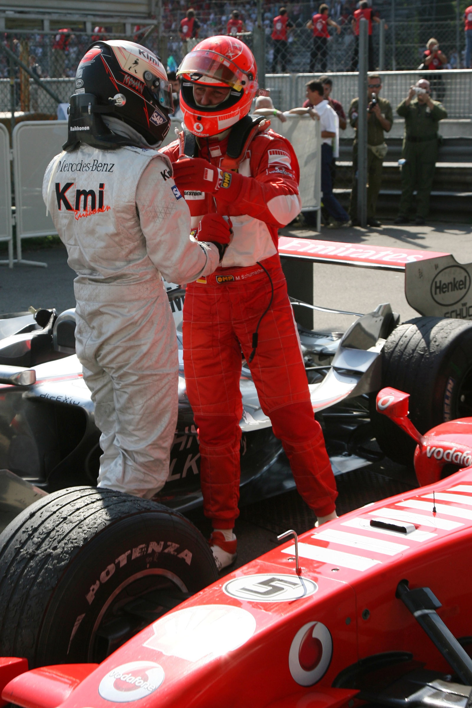 10.09.2006 Monza, Italy, Michael Schumacher (GER), Scuderia Ferrari and Kimi Raikkonen (FIN), Rkk