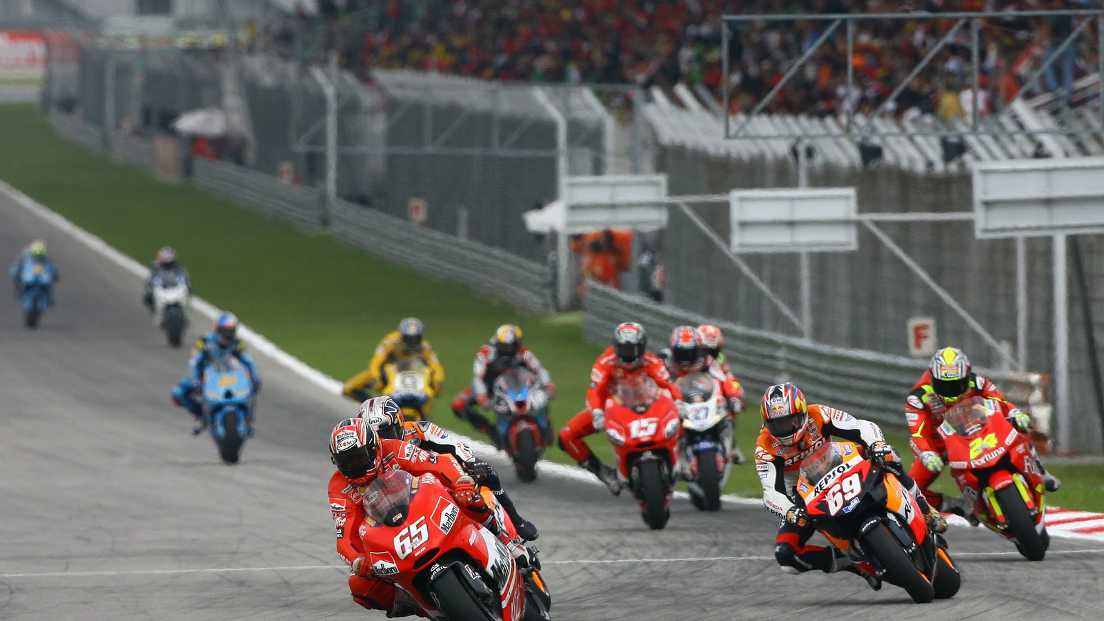 Capirossi leads, Malaysian MotoGP 2006.
