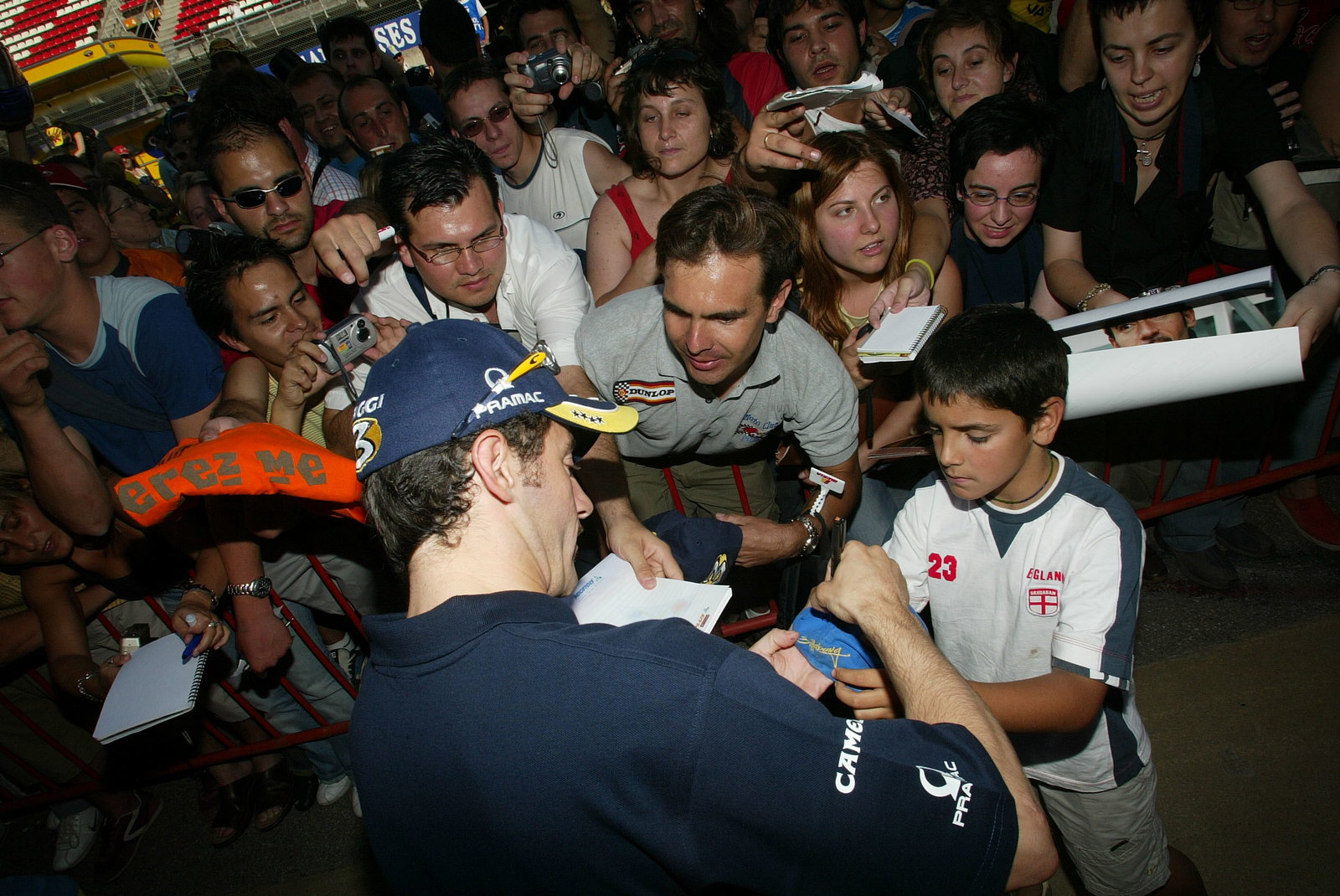 Biaggi with fans, Catalunya MotoGP 2004