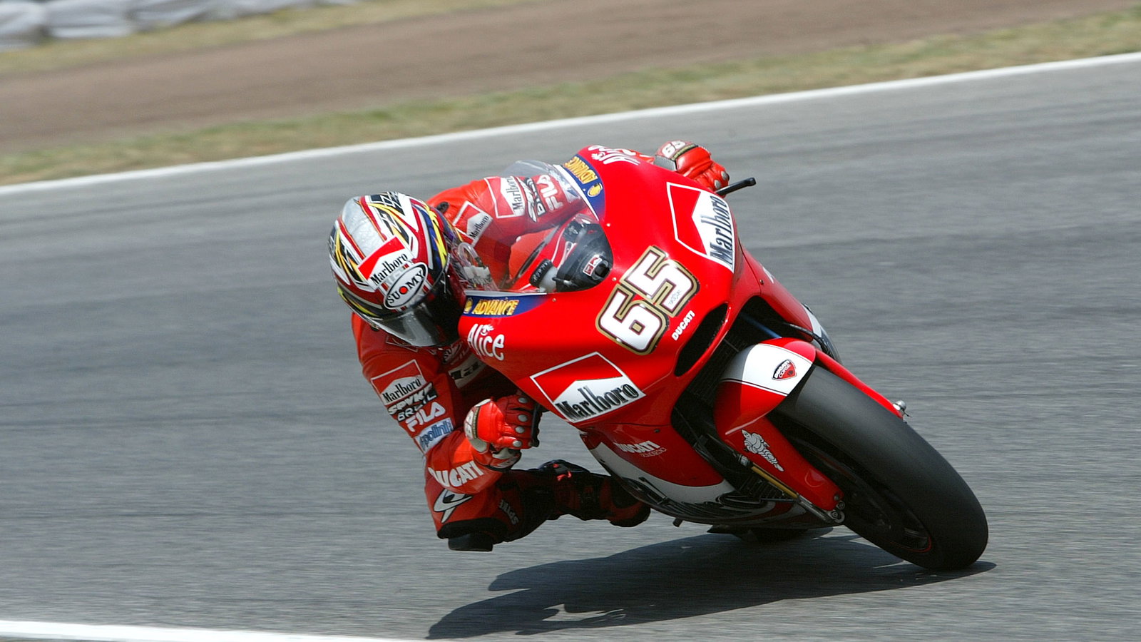 Capirossi slides, Catalunya MotoGP, 2004