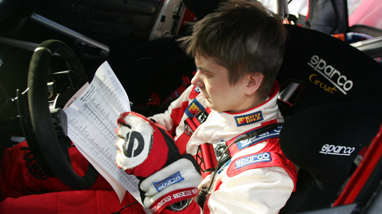 Toni Gardemeister (FIN) prepares reading the stage notes, MMSP Ltd Mitsubishi Lancer WR05. Swedish R
