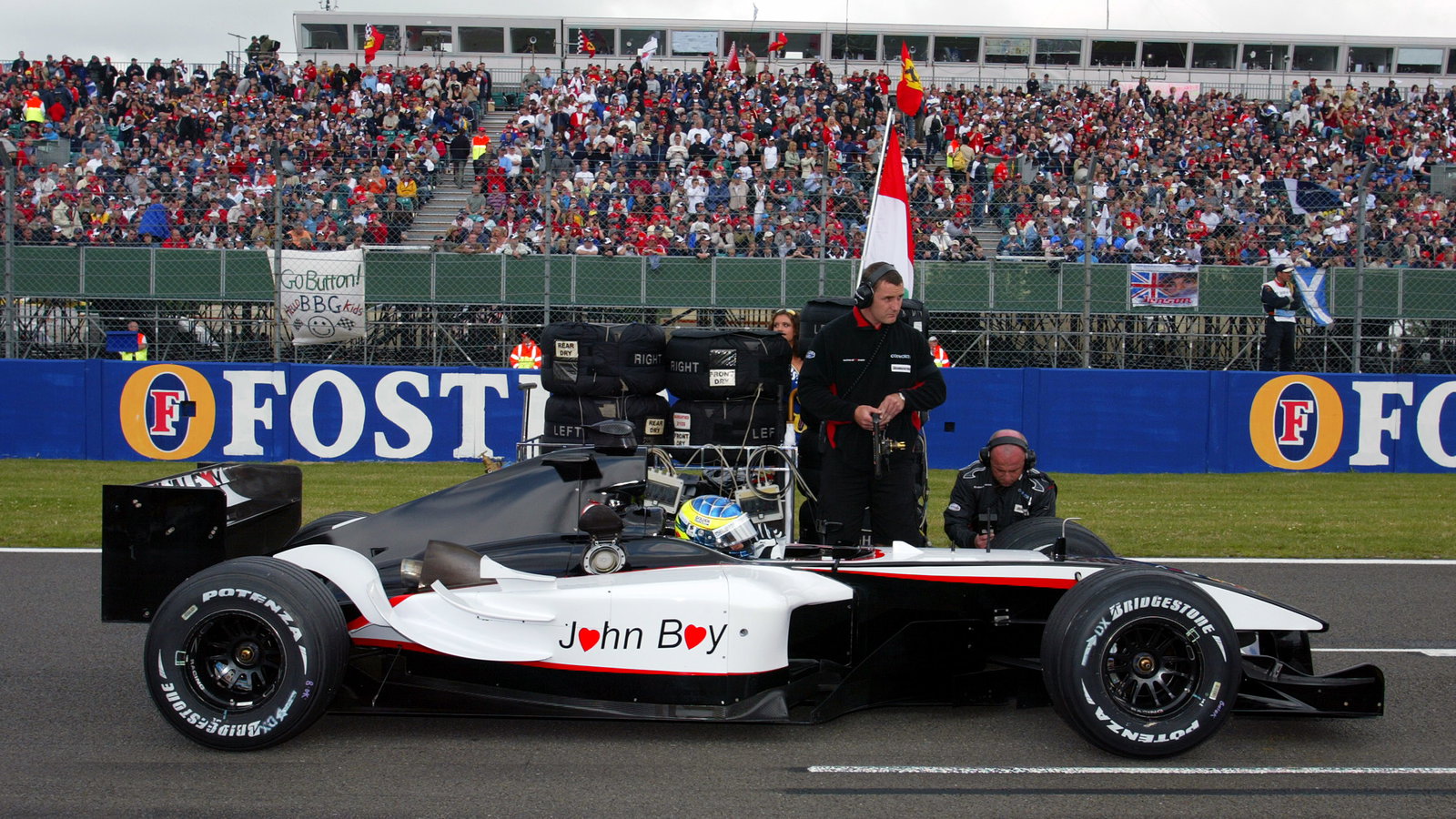 Zsolt Baumgartner`s unbranded Minardi F1 as a mark of respect for departed sporting director John Wa