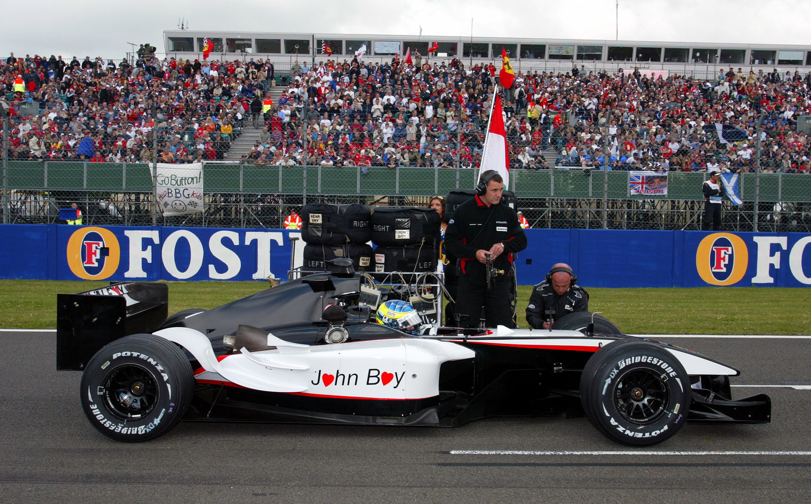 Zsolt Baumgartner`s unbranded Minardi F1 as a mark of respect for departed sporting director John Wa