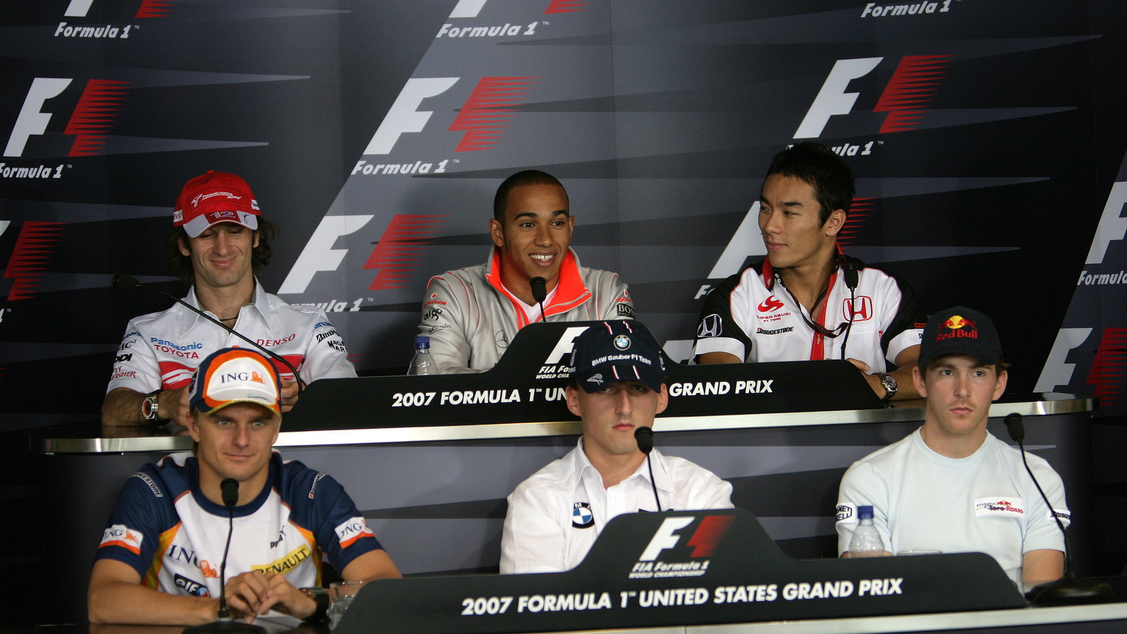 Jarno Trulli (ITA) Toyota TF107, Lewis Hamilton (GBR) McLaren MP4/22, Takuma Sato (JPN) Super Aguri 