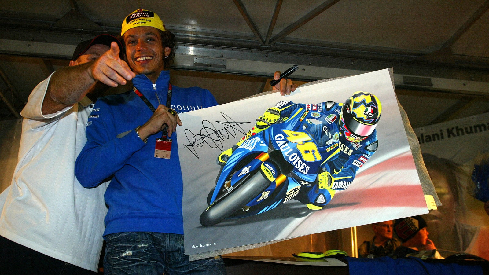 Rossi at Riders For Health auction, British MotoGP 2004