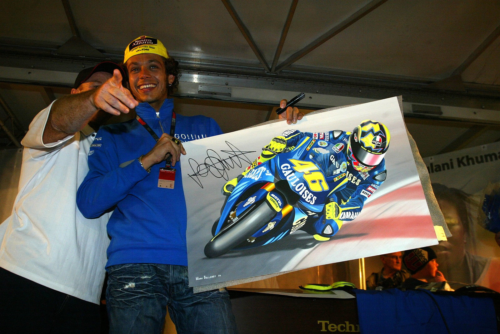 Rossi at Riders For Health auction, British MotoGP 2004
