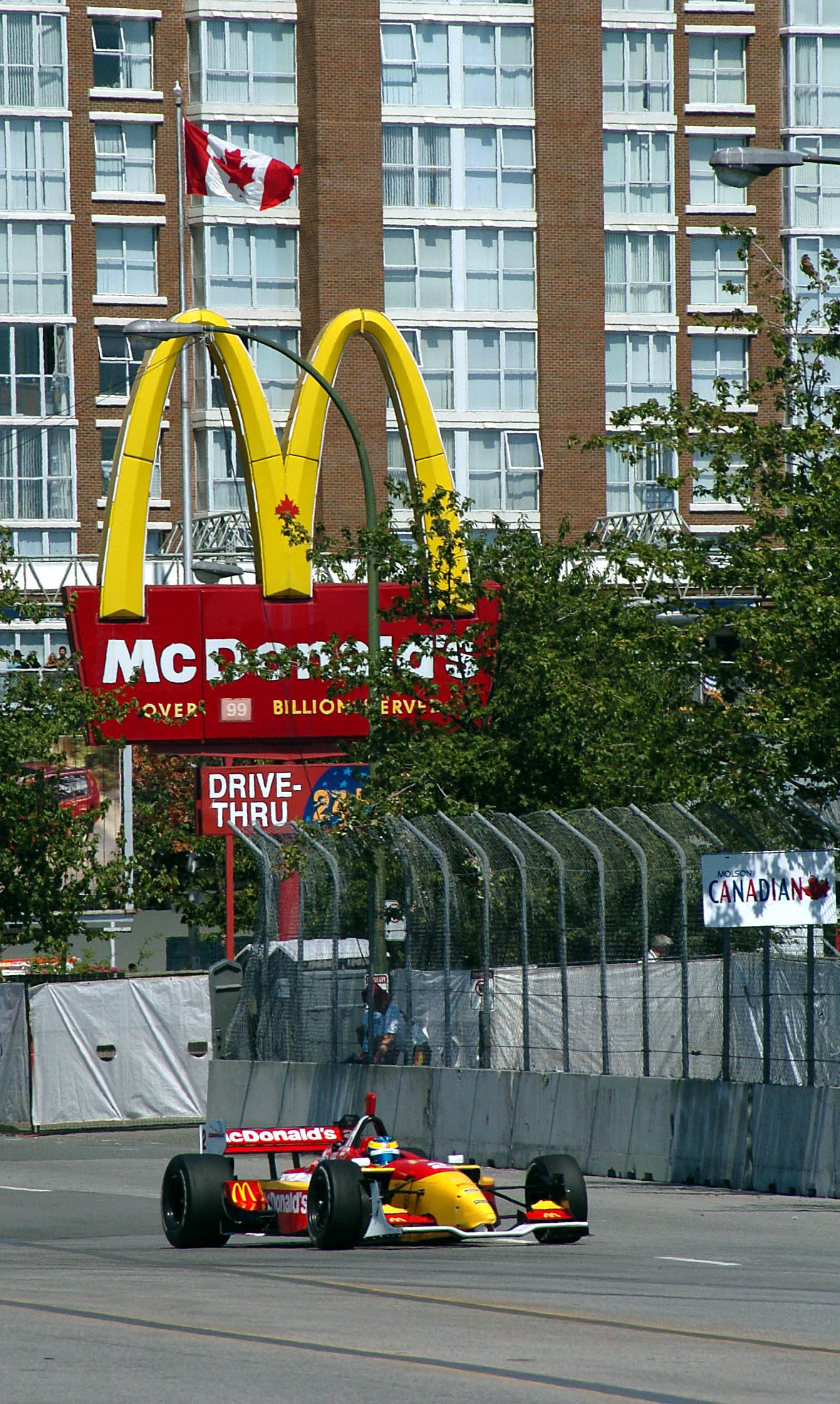 Sebastien Bourdais does some free promotional work for McDonalds in Vancouver