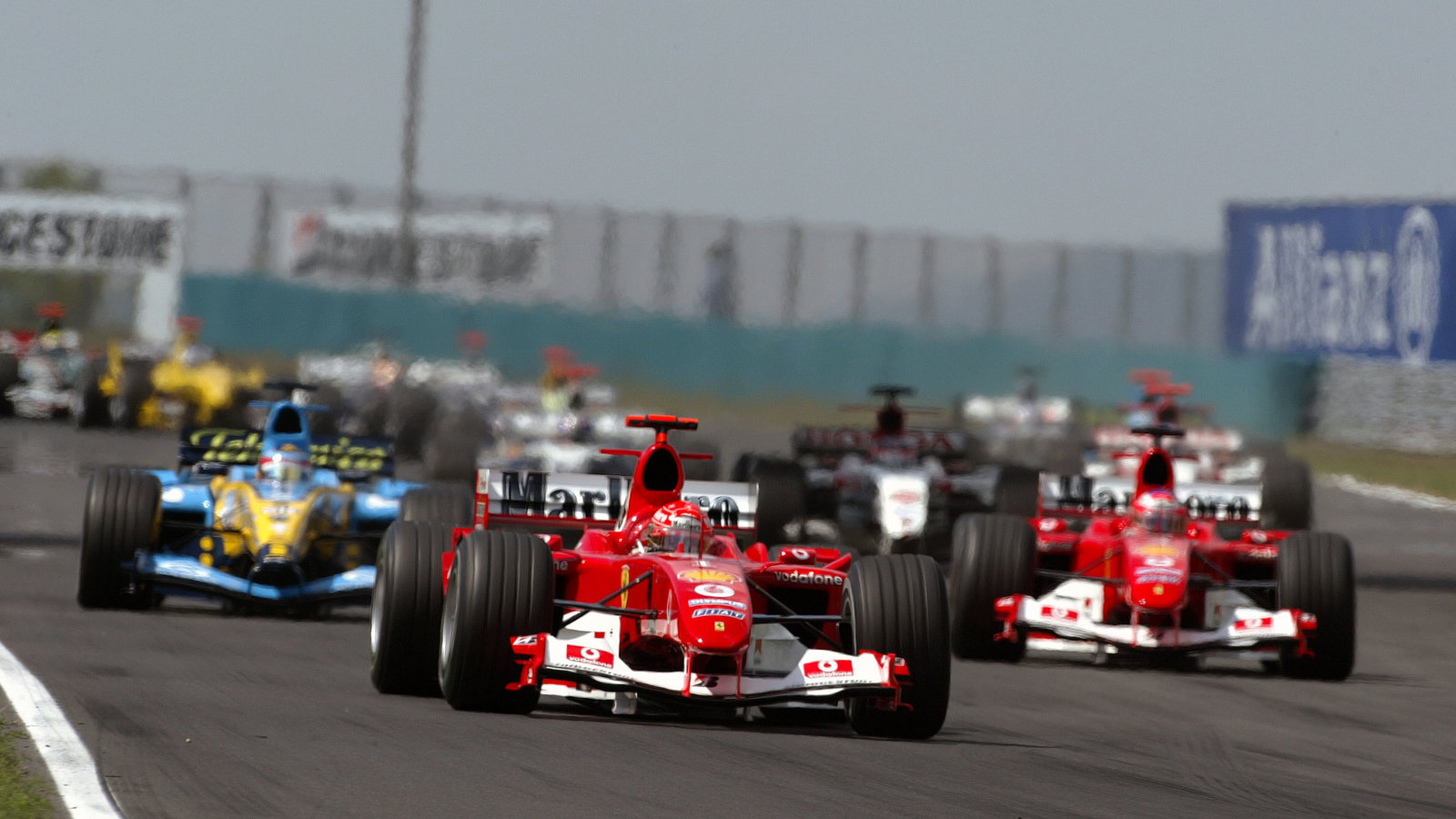 Michael Schumacher, Ferrari leads at the start of the Hungarian GP