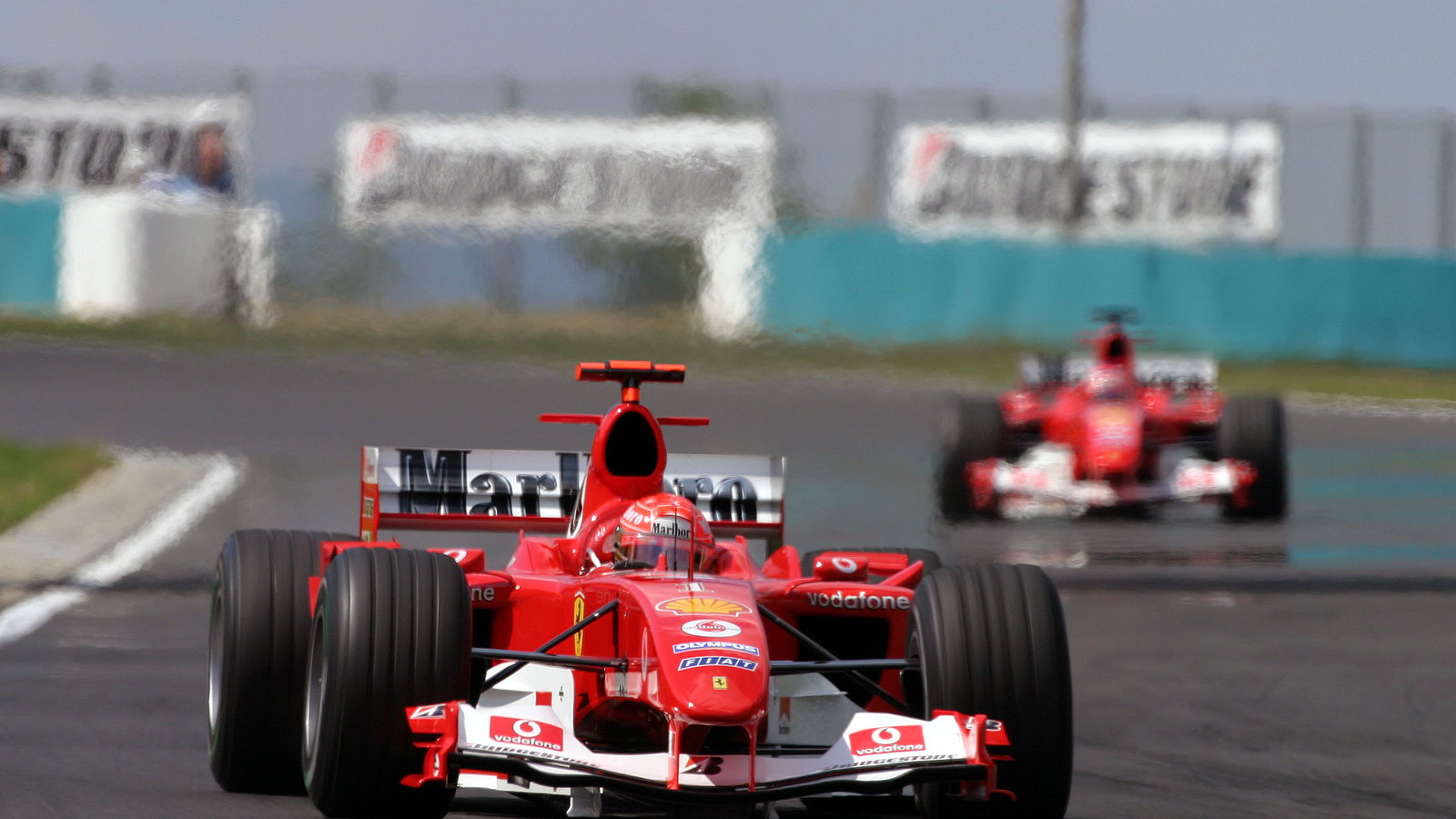 Michael Schumacher leads his Ferrari team mate
Rubens Barrichello