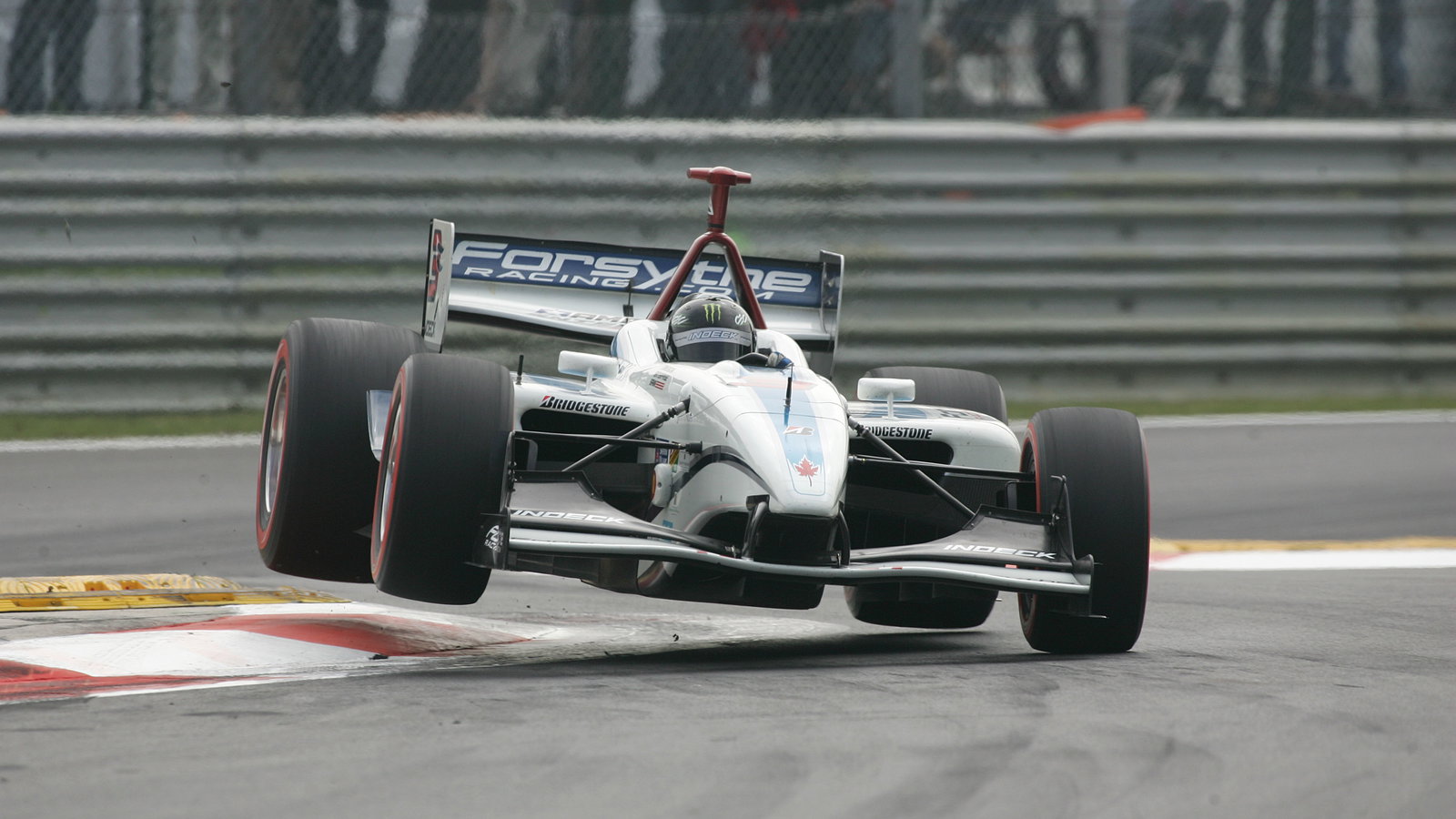 24-26 August 2007, Heusden-Zolder, BelgiumPaul Tracy jumps the curb through the chicane.