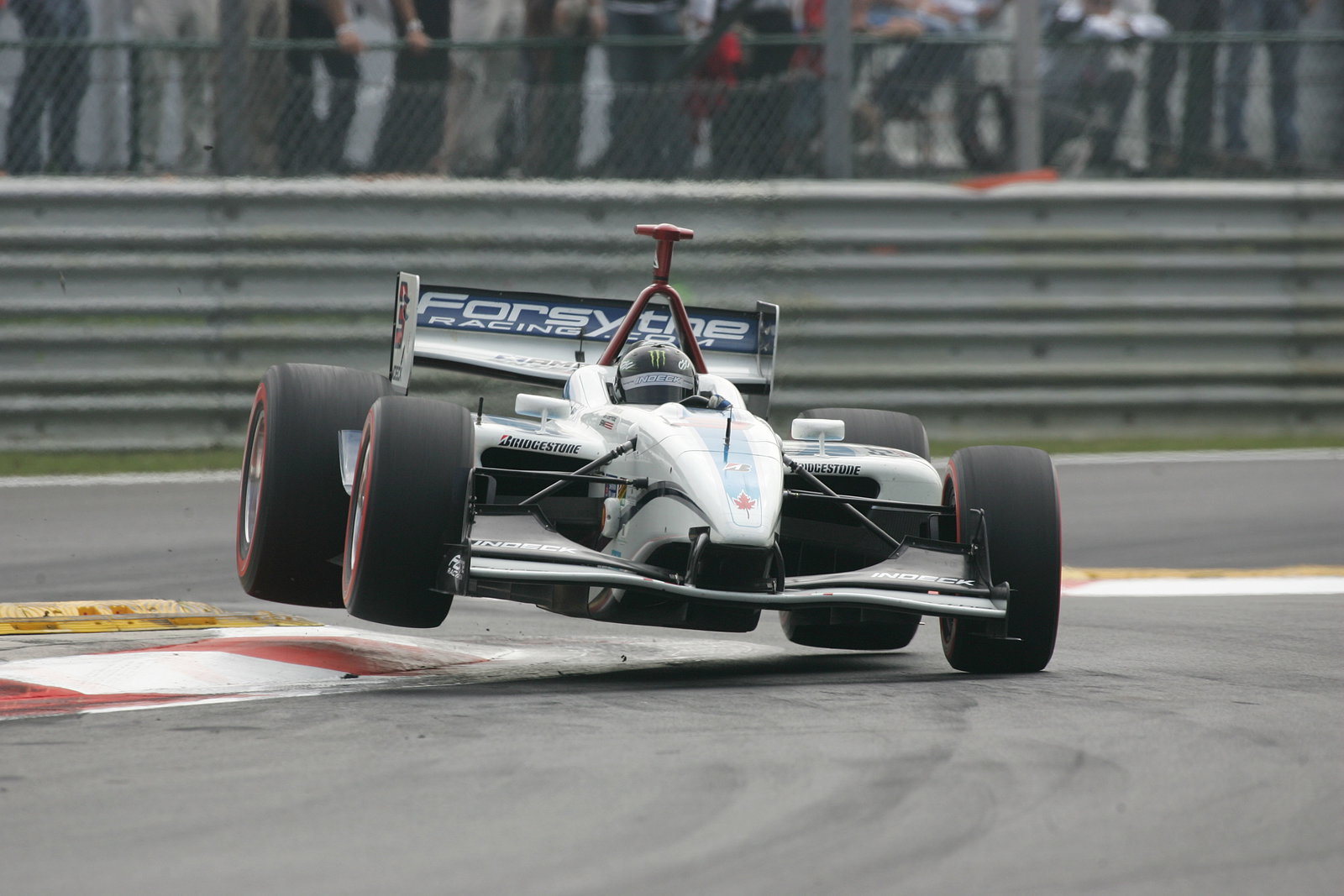 24-26 August 2007, Heusden-Zolder, BelgiumPaul Tracy jumps the curb through the chicane.