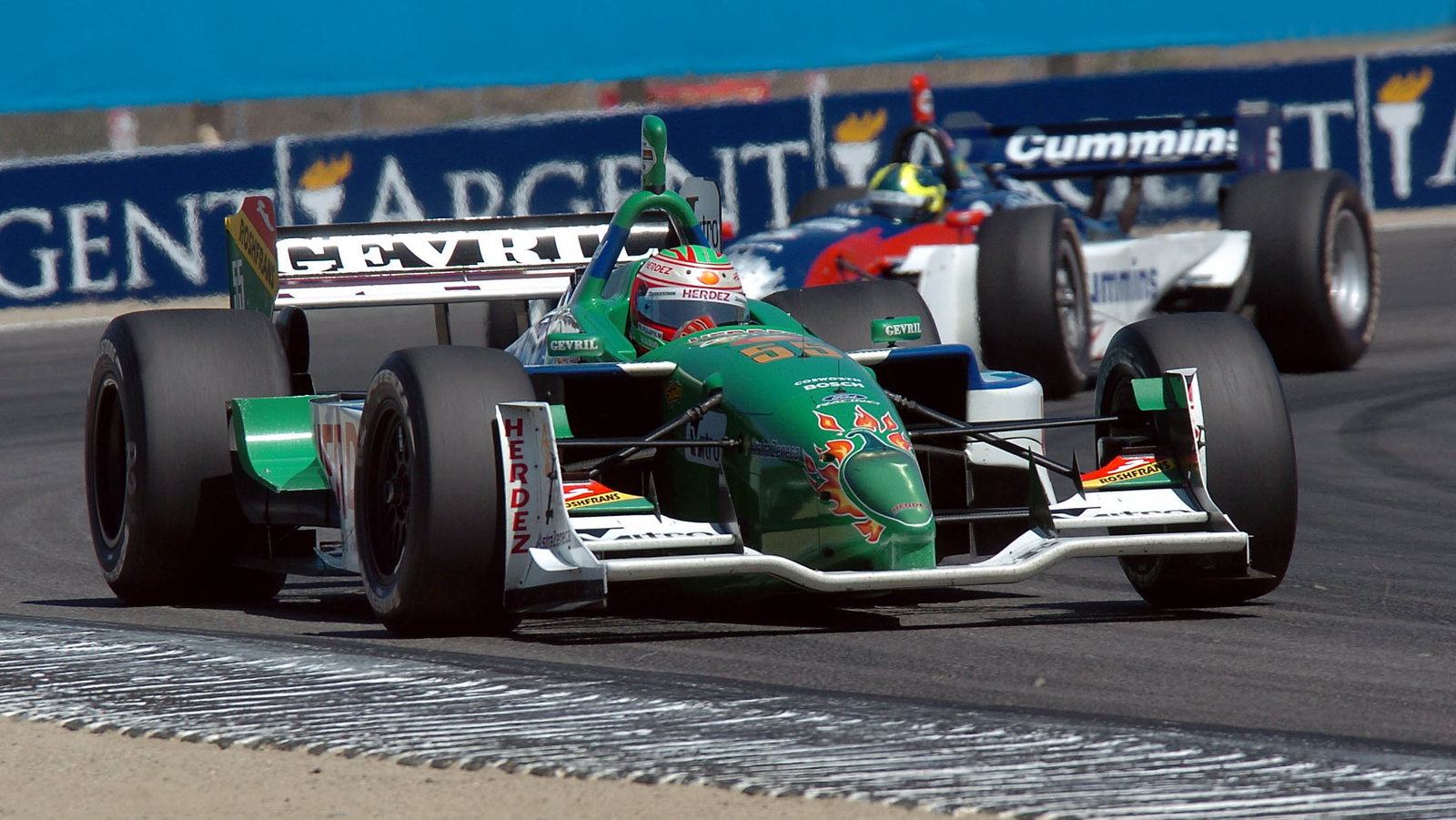 Mario Dominguez leads Mario Haberfeld at Laguna Seca.