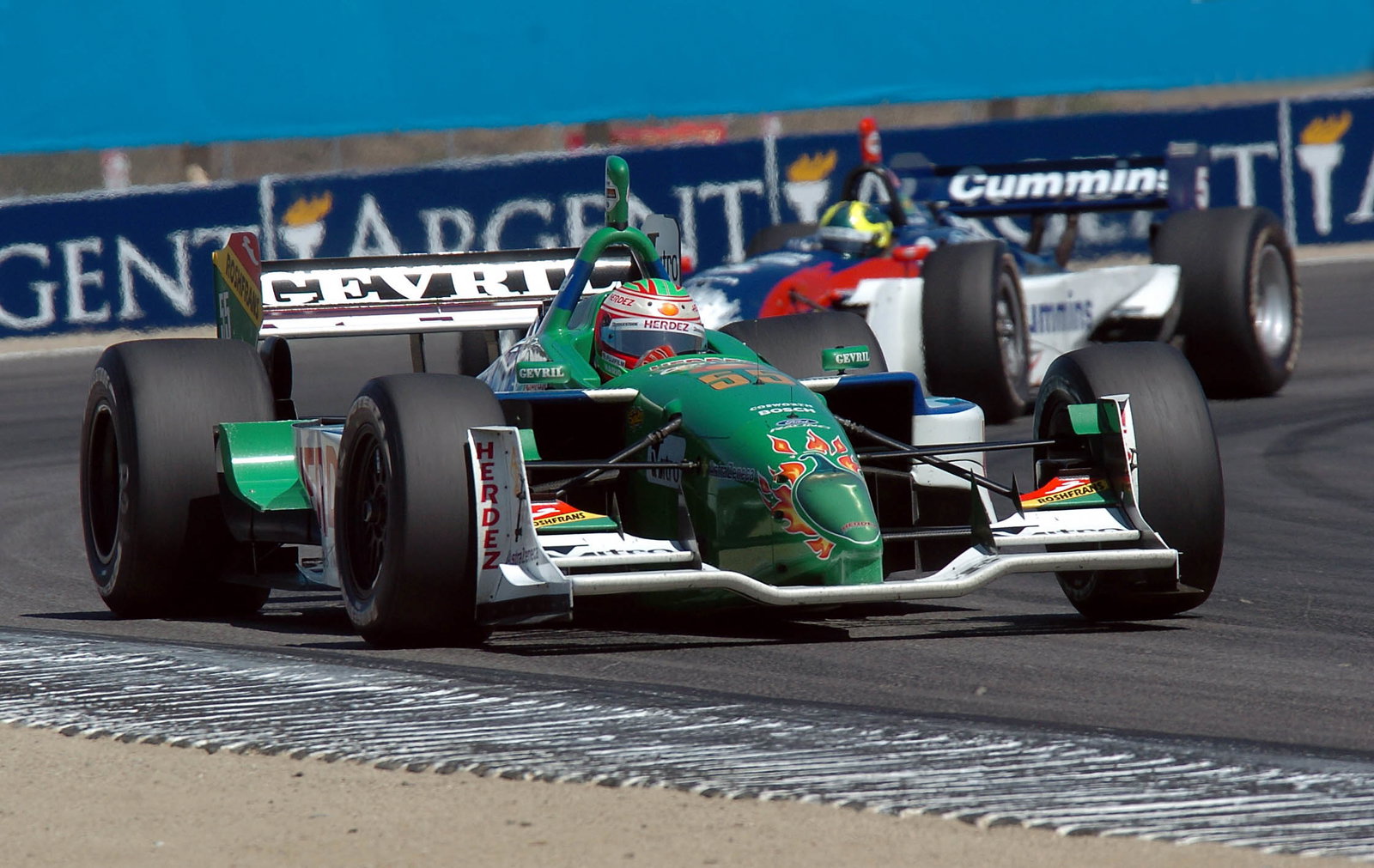 Mario Dominguez leads Mario Haberfeld at Laguna Seca.
