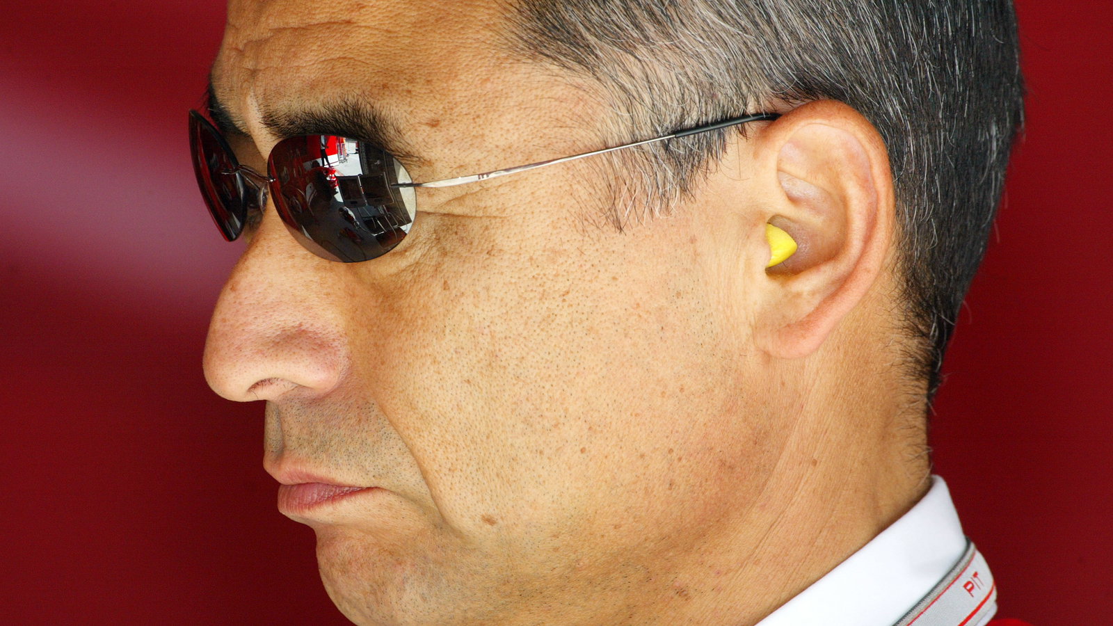 Mr Hiroshi Yazukawa of Bridgestone watches proceedings at the Chinese Grand Prix