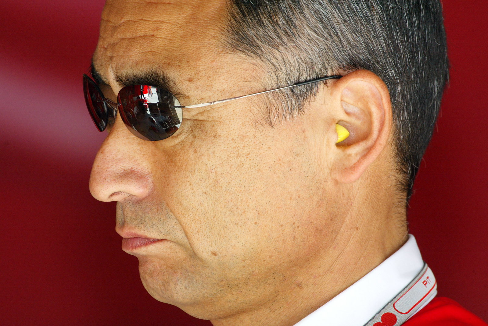 Mr Hiroshi Yazukawa of Bridgestone watches proceedings at the Chinese Grand Prix