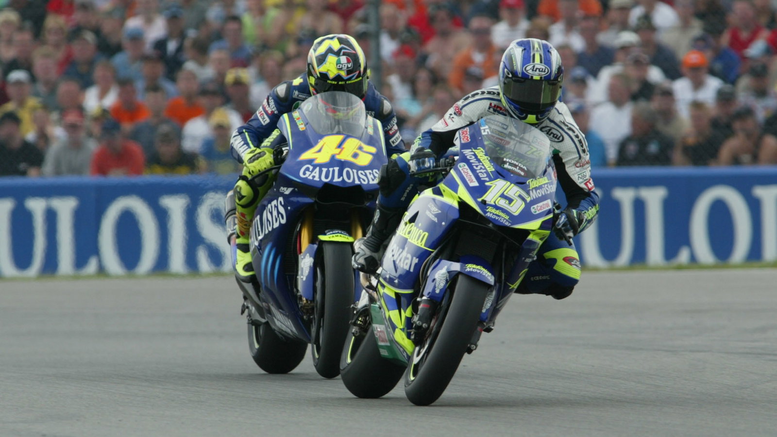 Sete Gibernau and Valentino Rossi battle at Assen.