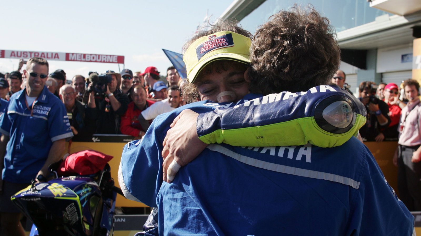 Rossi celebrates with Burgess, Australian MotoGP Race 2004