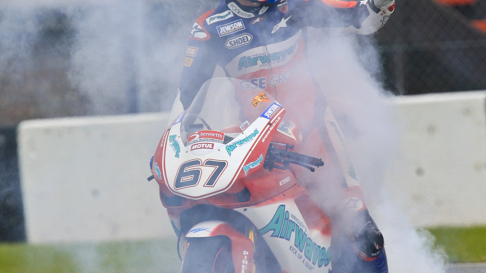 67. Shane Byrne Airwaves Ducati, Ducati 1098R F08 performs a burnout after winning race 2