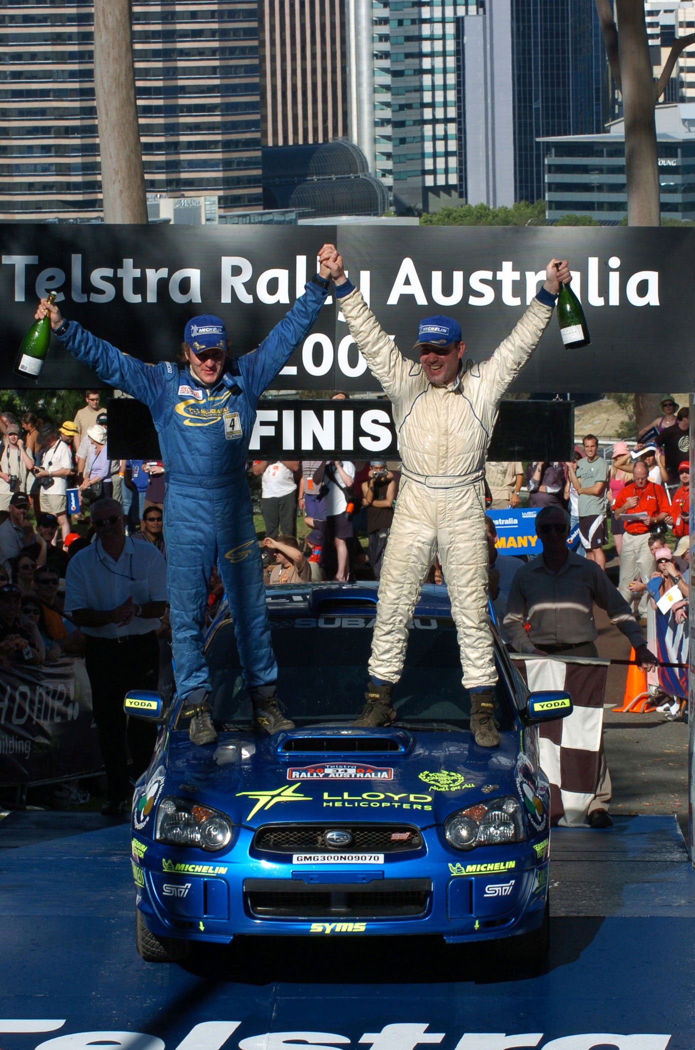 Niall McShea and Chris Patterson celebrate on the podium in Oz after finishing second to clinch the 