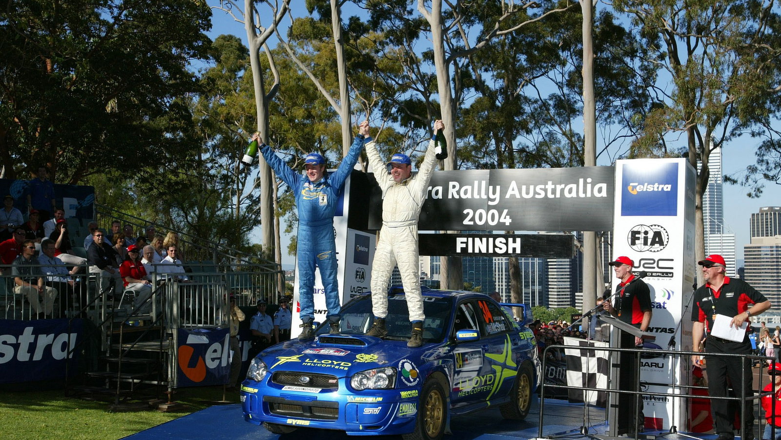Niall McShea and Chris Patterson celebrate on the podium in Oz after finishing second to clinch the 