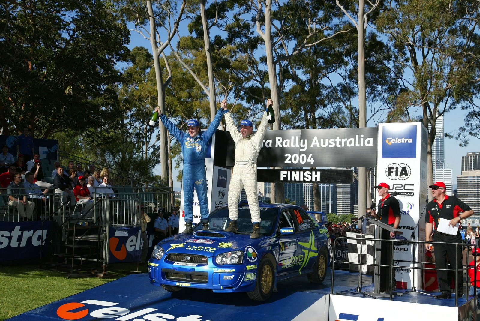 Niall McShea and Chris Patterson celebrate on the podium in Oz after finishing second to clinch the 