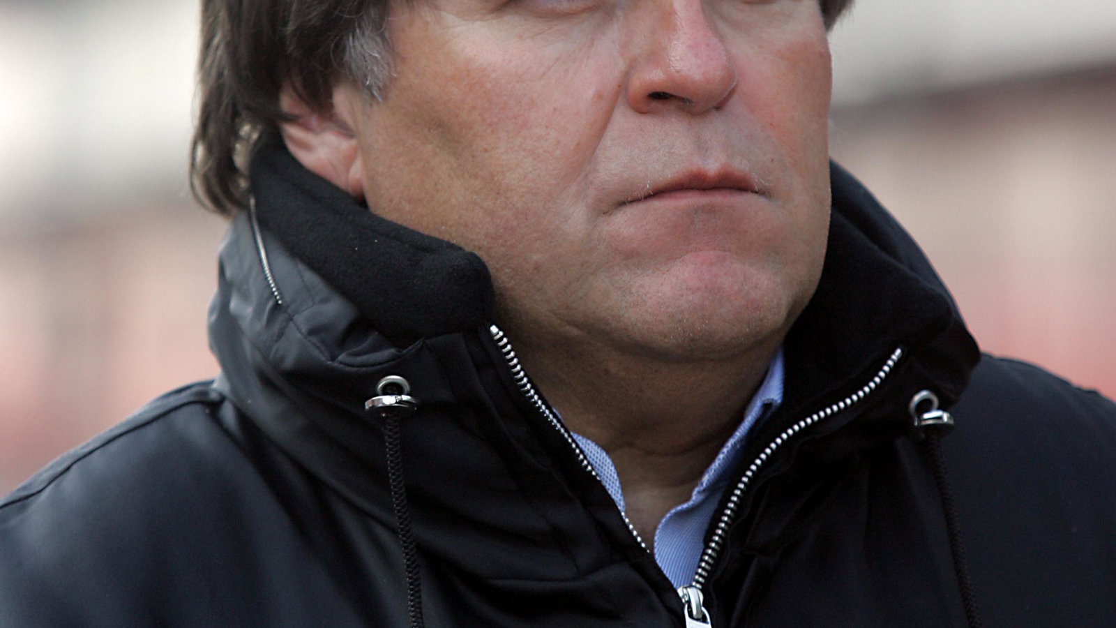 Mercedes motorsport VP Norbert Haug watches the debut of the new McLaren MP4-20 in Barcelona