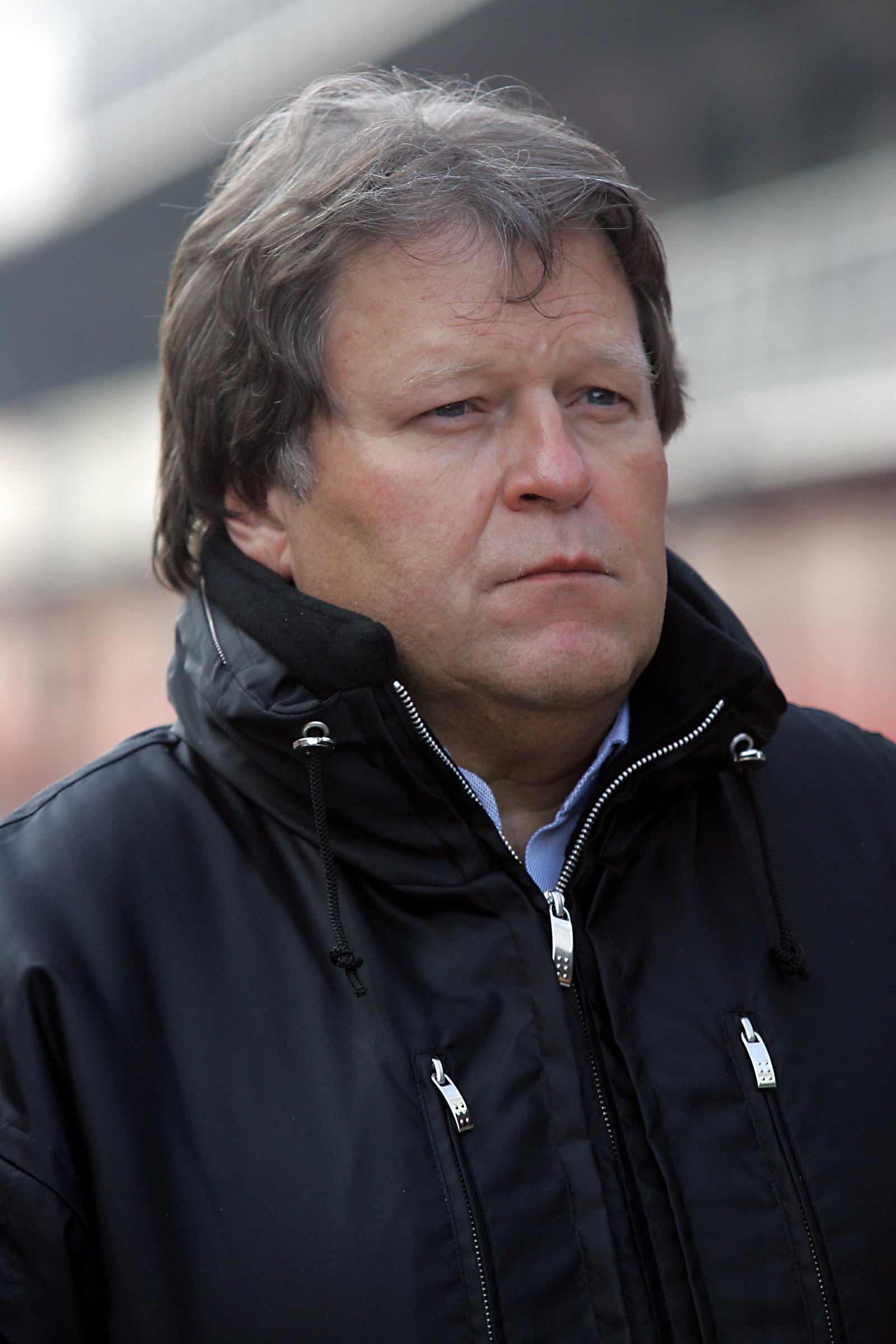 Mercedes motorsport VP Norbert Haug watches the debut of the new McLaren MP4-20 in Barcelona