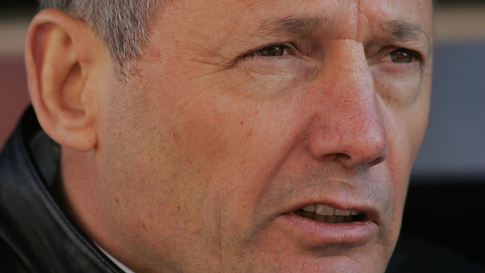 Ron Dennis watches the first test of the new McLaren-Mercedes MP4-20 in Barcelona