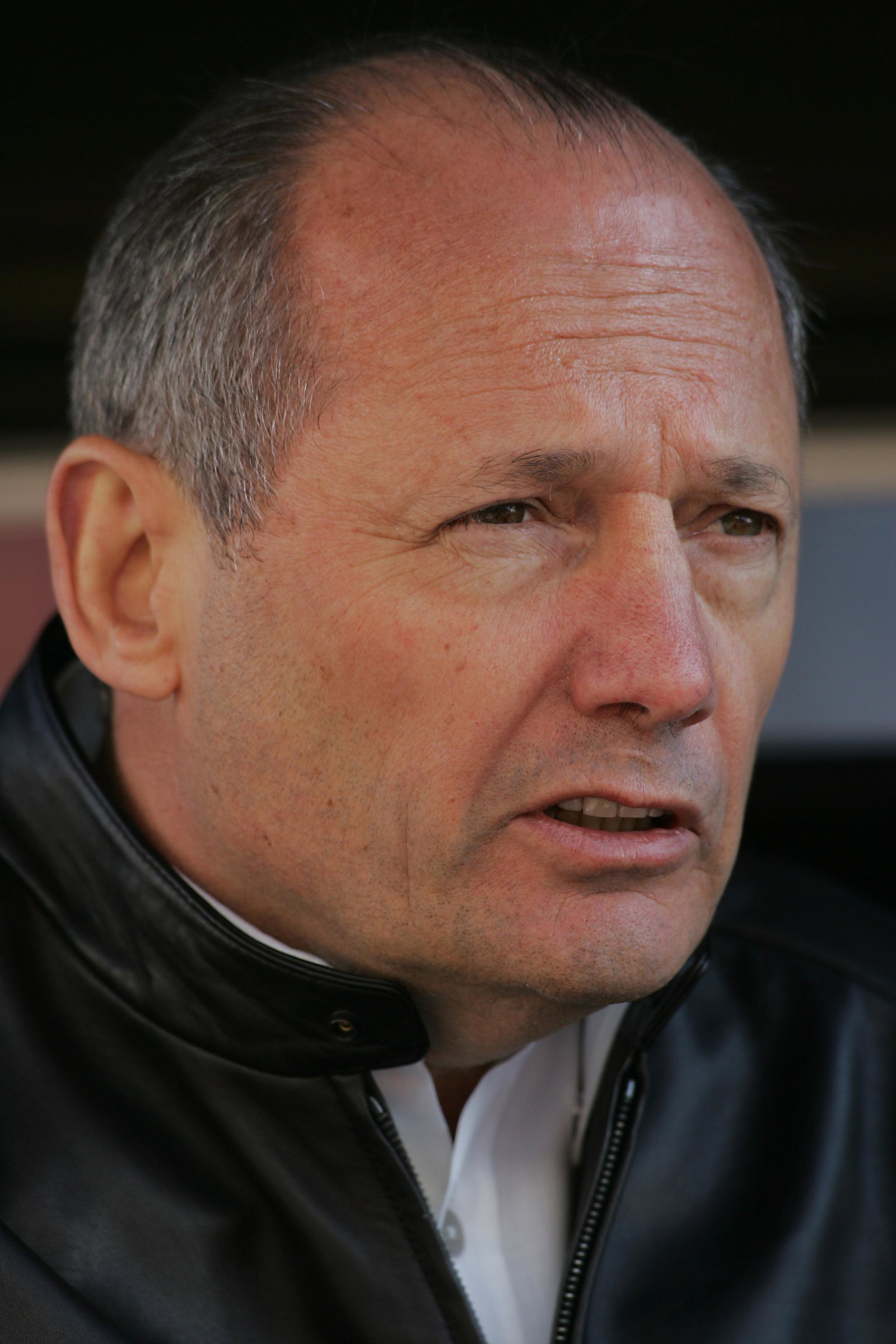 Ron Dennis watches the first test of the new McLaren-Mercedes MP4-20 in Barcelona