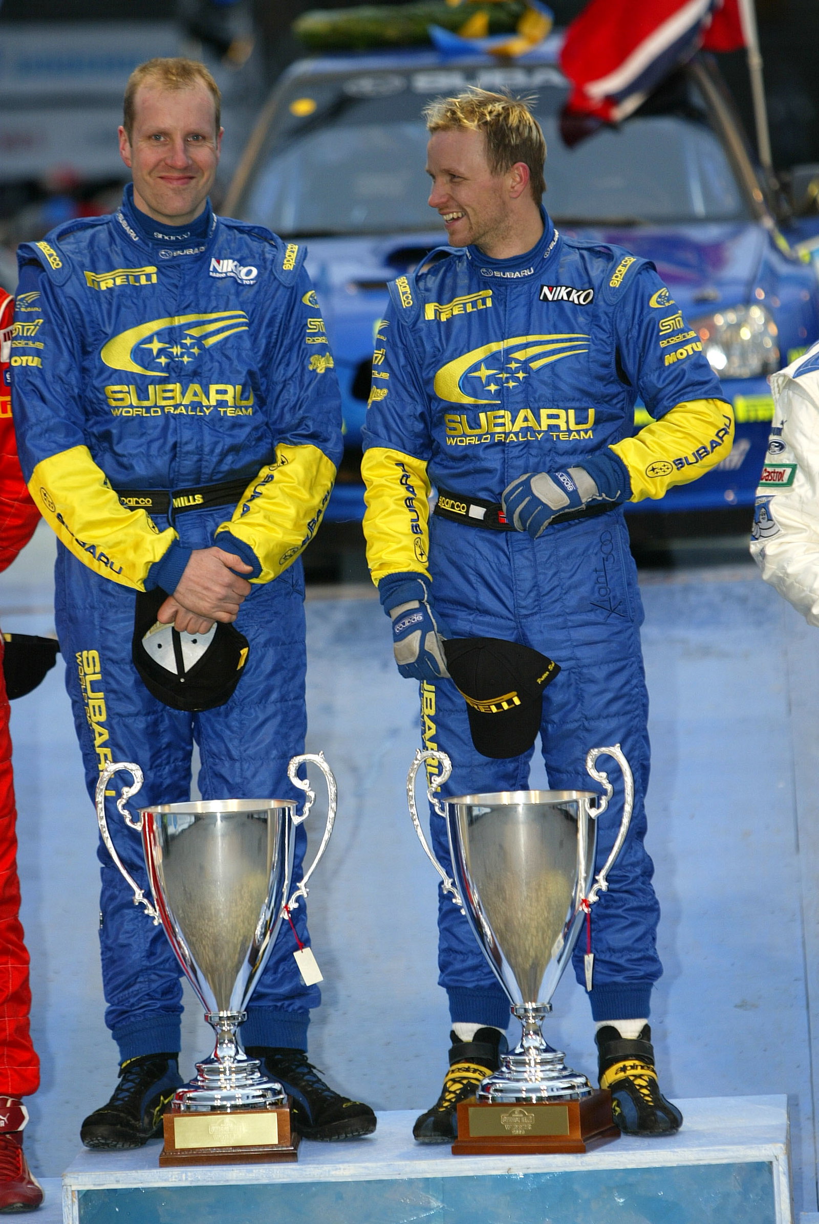 Subaru`s Petter Solberg and Phil Mills celebrate their victory on the Swedish Rally