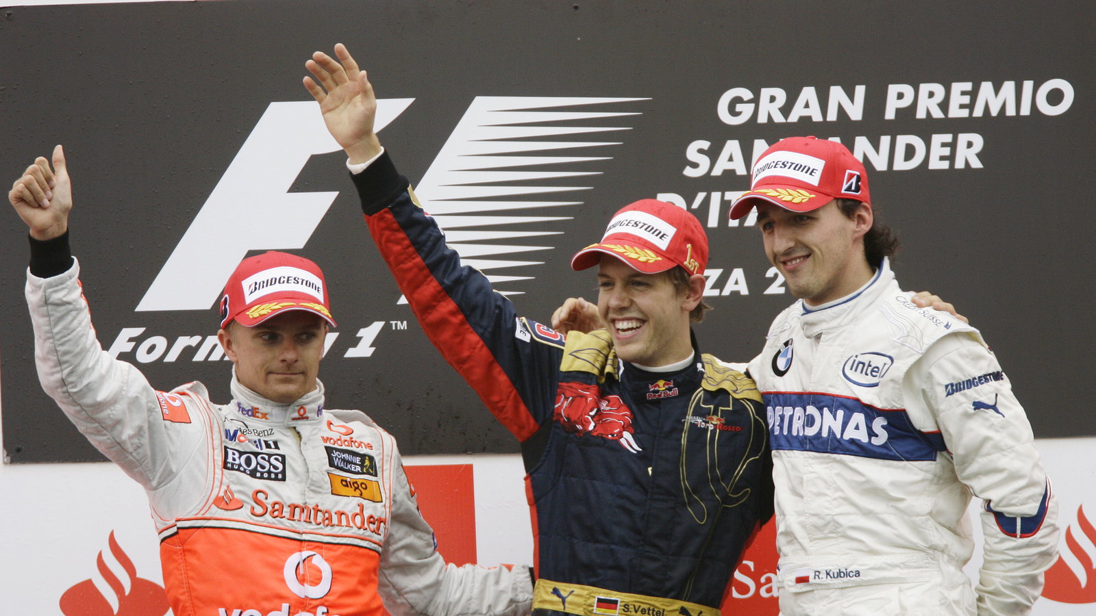 Heikki Kovalainen (FIN) McLaren MP4-23, Sebastian Vettel (GER) Toro Rosso STR03, Robert Kubica (POL)