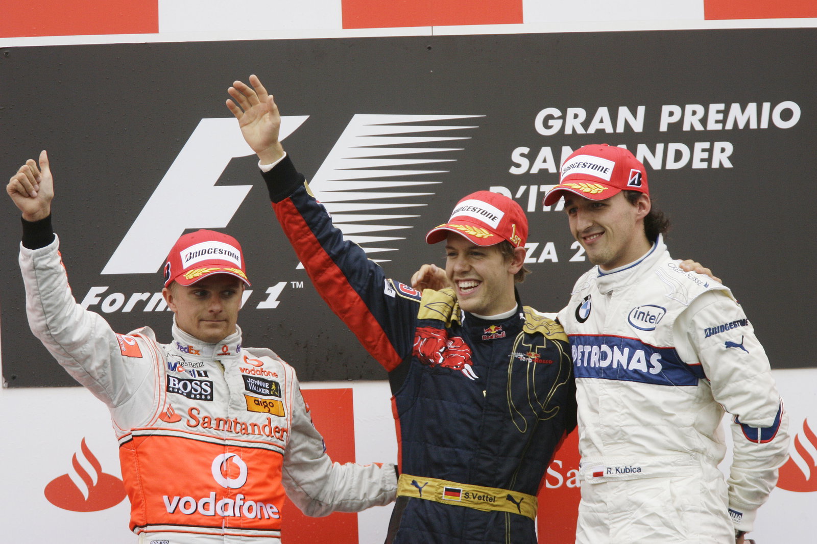 Heikki Kovalainen (FIN) McLaren MP4-23, Sebastian Vettel (GER) Toro Rosso STR03, Robert Kubica (POL)