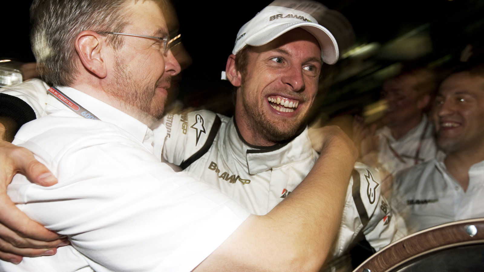Ross Brawn (GBR) Team Principal, Brawn GP & Jenson Button (GBR) Brawn BGP001 Celebrate Maiden Win, A