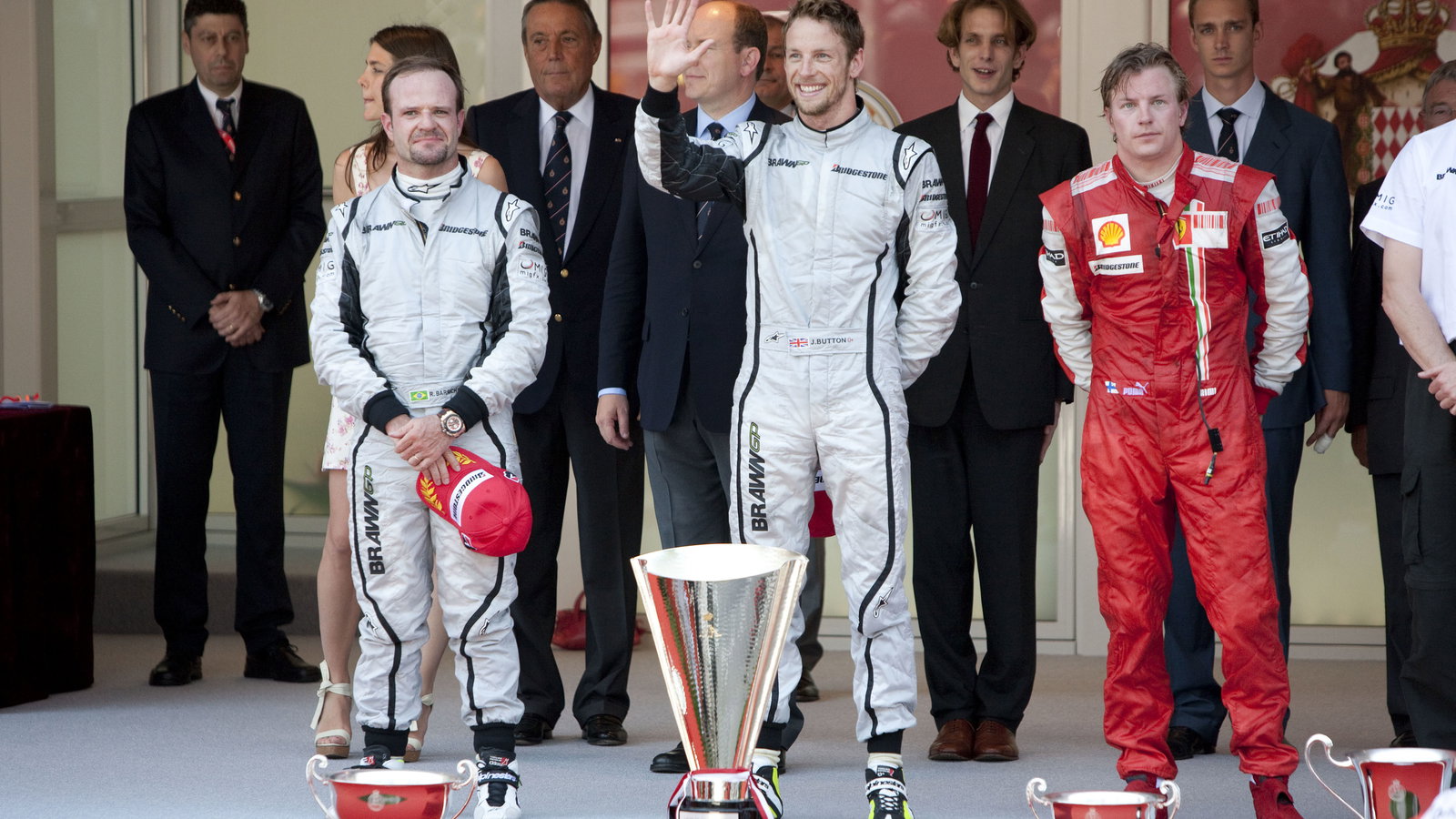 Rubens Barrichello (BRA) Brawn BGP001, Jenson Button (GBR) Brawn BGP001, Kimi Raikkonen (FIN) Ferrar