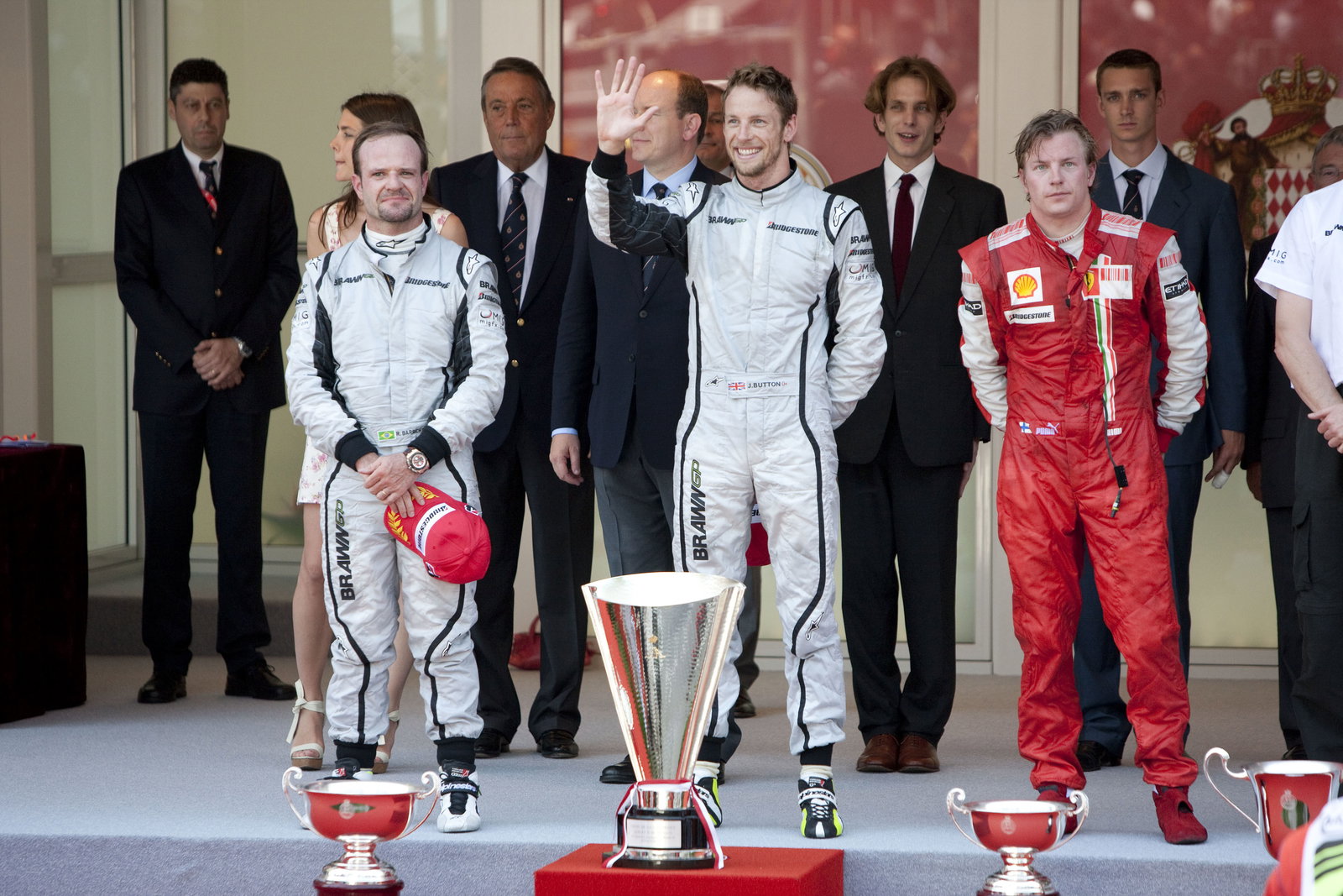 Rubens Barrichello (BRA) Brawn BGP001, Jenson Button (GBR) Brawn BGP001, Kimi Raikkonen (FIN) Ferrar