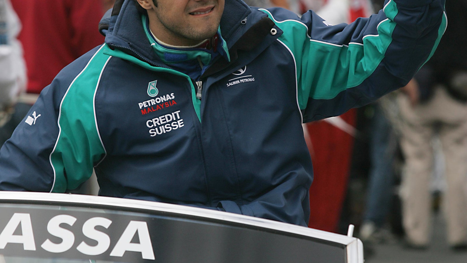 Felipe Massa waves to the Melbourne crowd during the drivers` parade