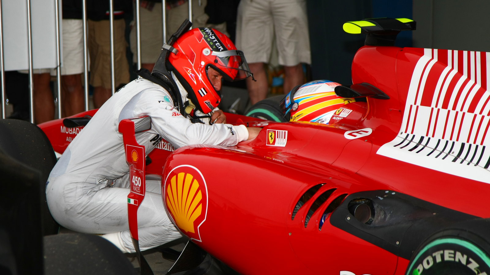 Fernando Alonso (ESP) Scuderia Ferrari F10 & Michael Schumacher, Mercedes GP MGP W01