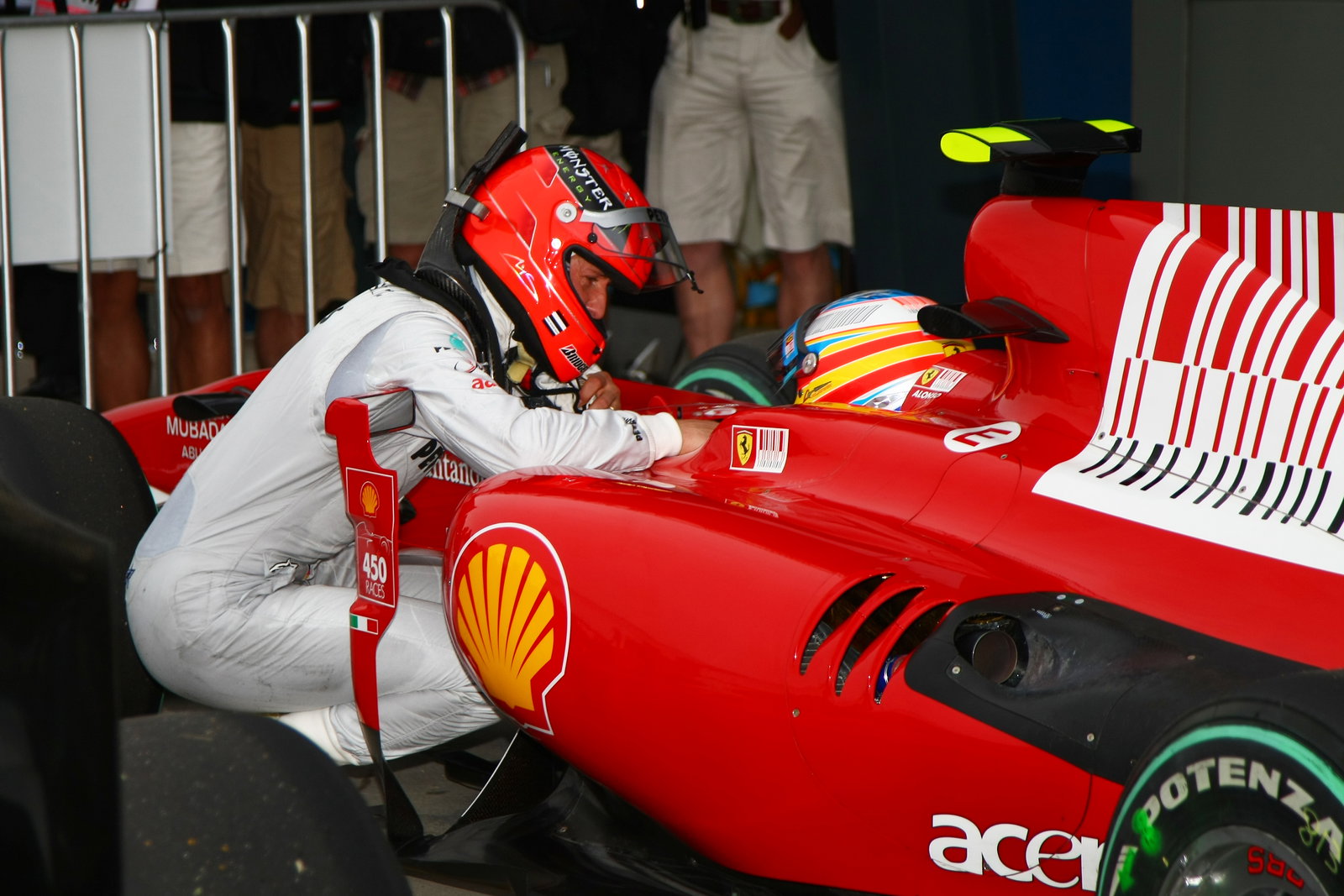 Fernando Alonso (ESP) Scuderia Ferrari F10 & Michael Schumacher, Mercedes GP MGP W01