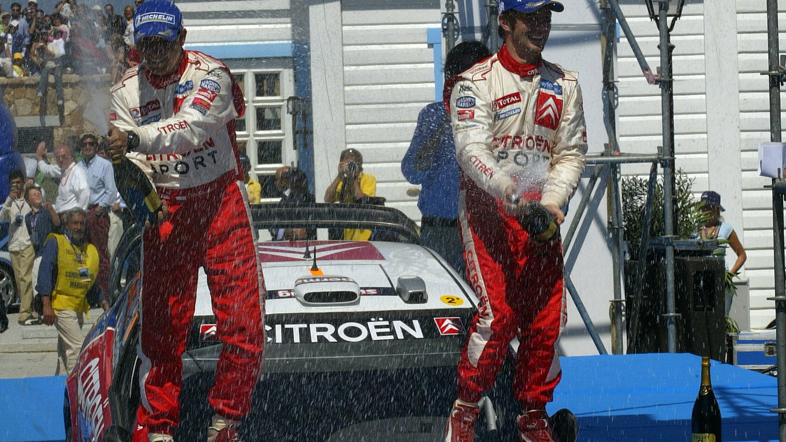 Citroen`s Sebastien Loeb and Daniel Elena celebrate their victory in Sardinia