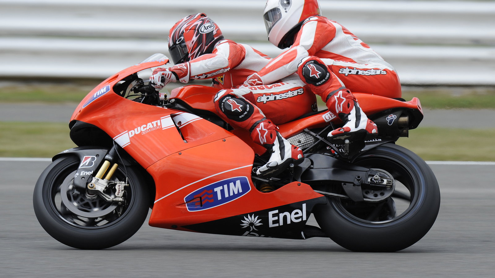 Martin Brundle on the back of Randy Mamola, British MotoGP 2010