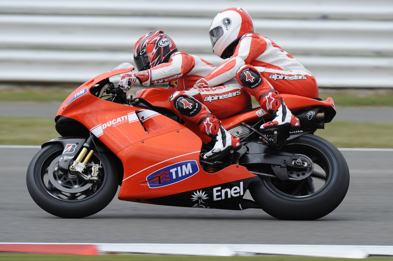 Martin Brundle on the back of Randy Mamola, British MotoGP 2010