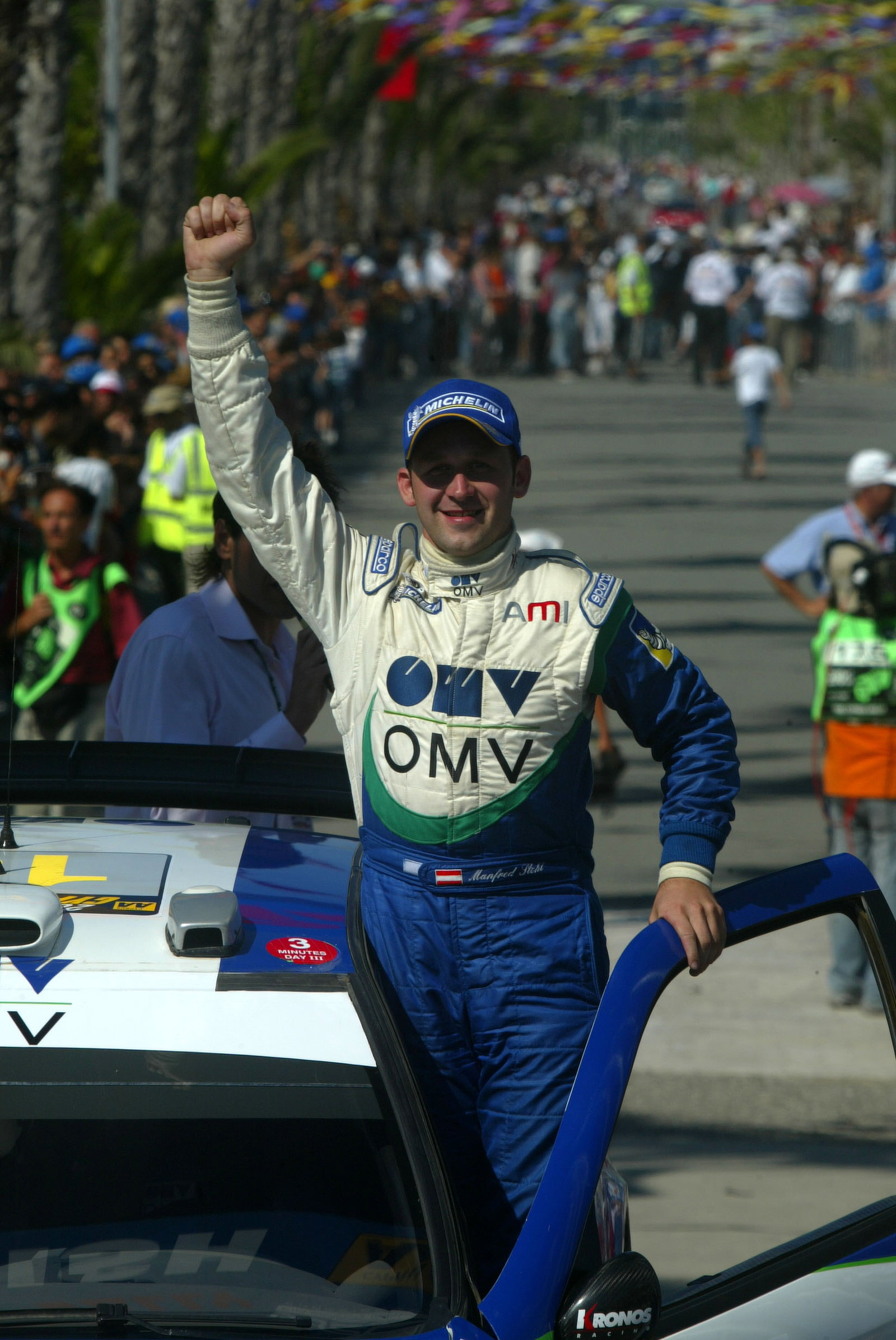 Manfred Stohl celebrates after finishing second in Cyprus