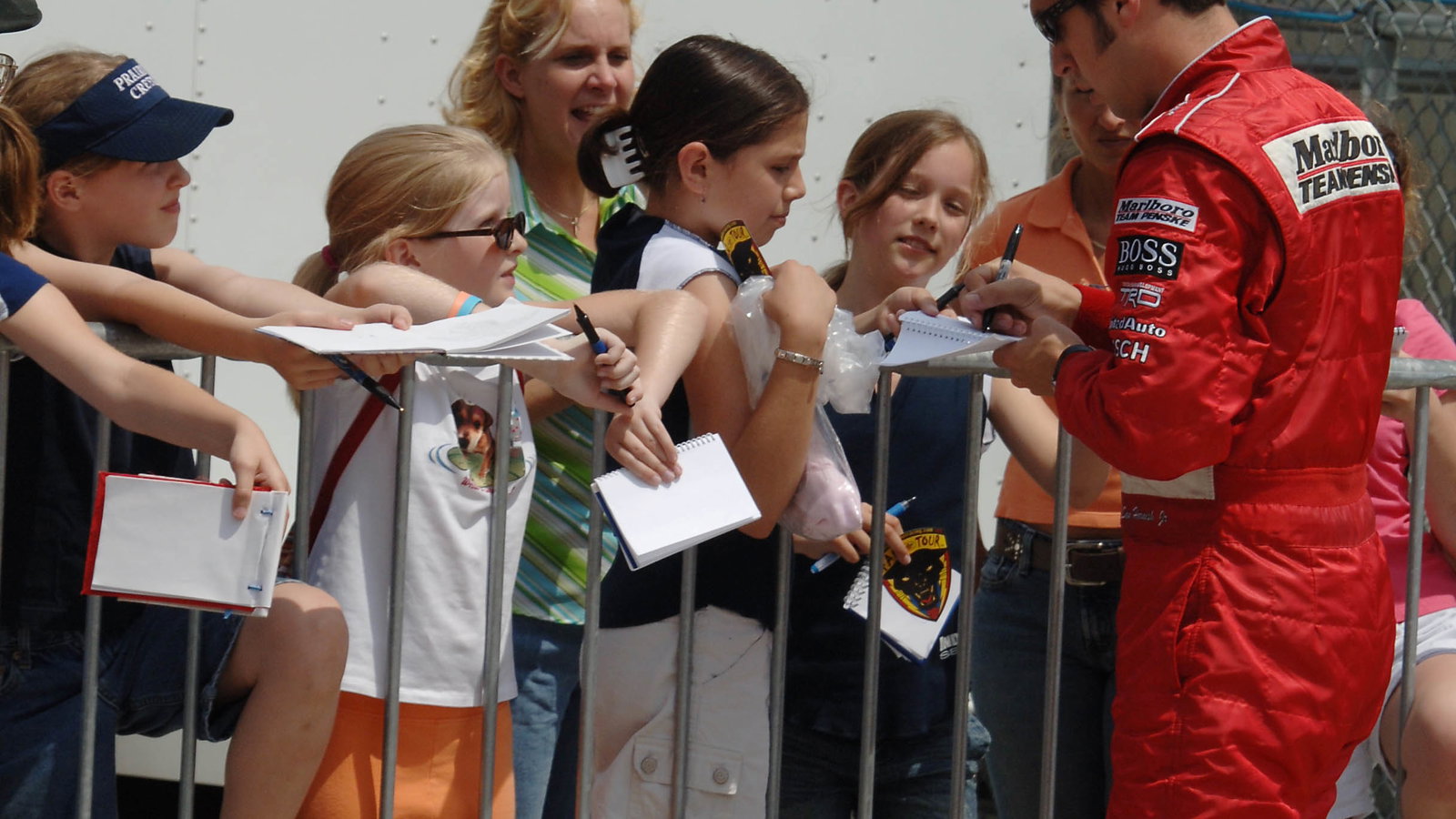 Sam Hornish Jr signs autographs at Indianapolis.