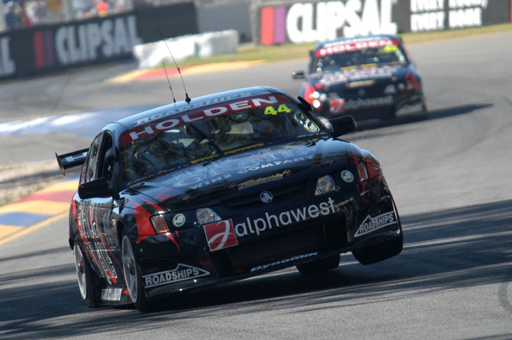 Team Dynamik`s Simon Wills getting maximum attitude from his V8 beast.