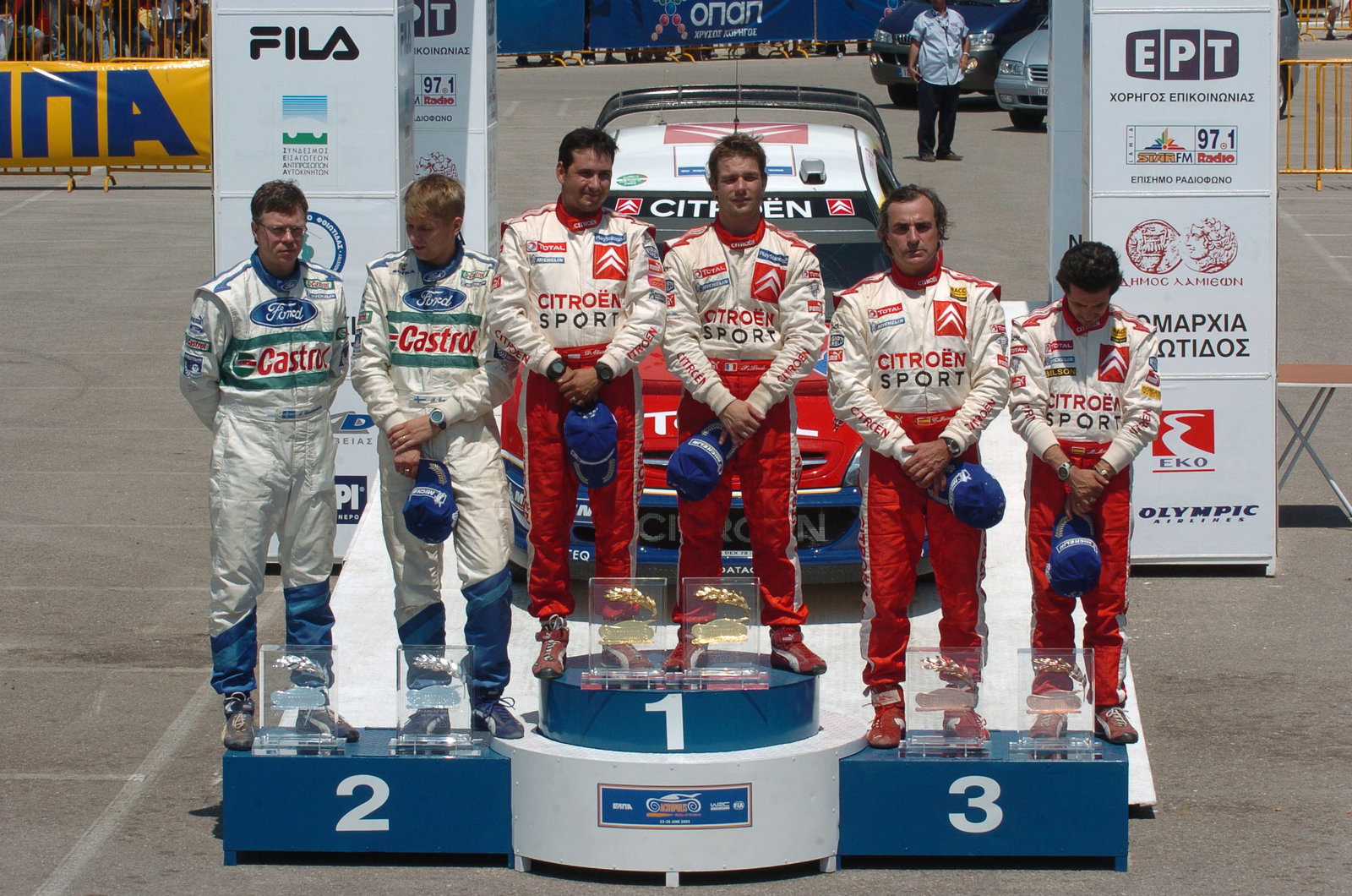 Acropolis Rally winners, Sebastien Loeb and Daniel Elena on the podium with Toni Gardemeister and J