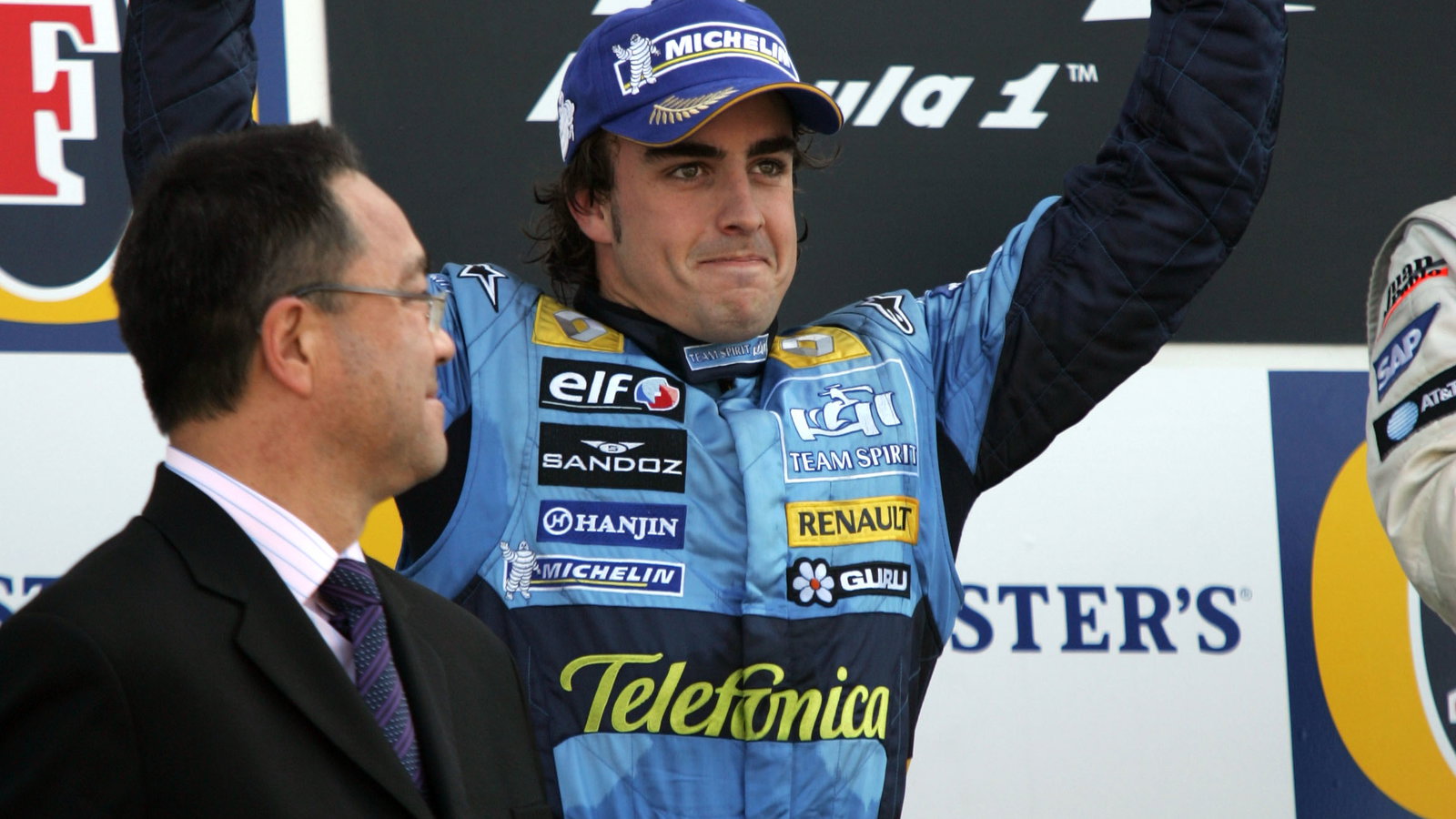 Fernando Alonso celebrates after finishing second at the British GP