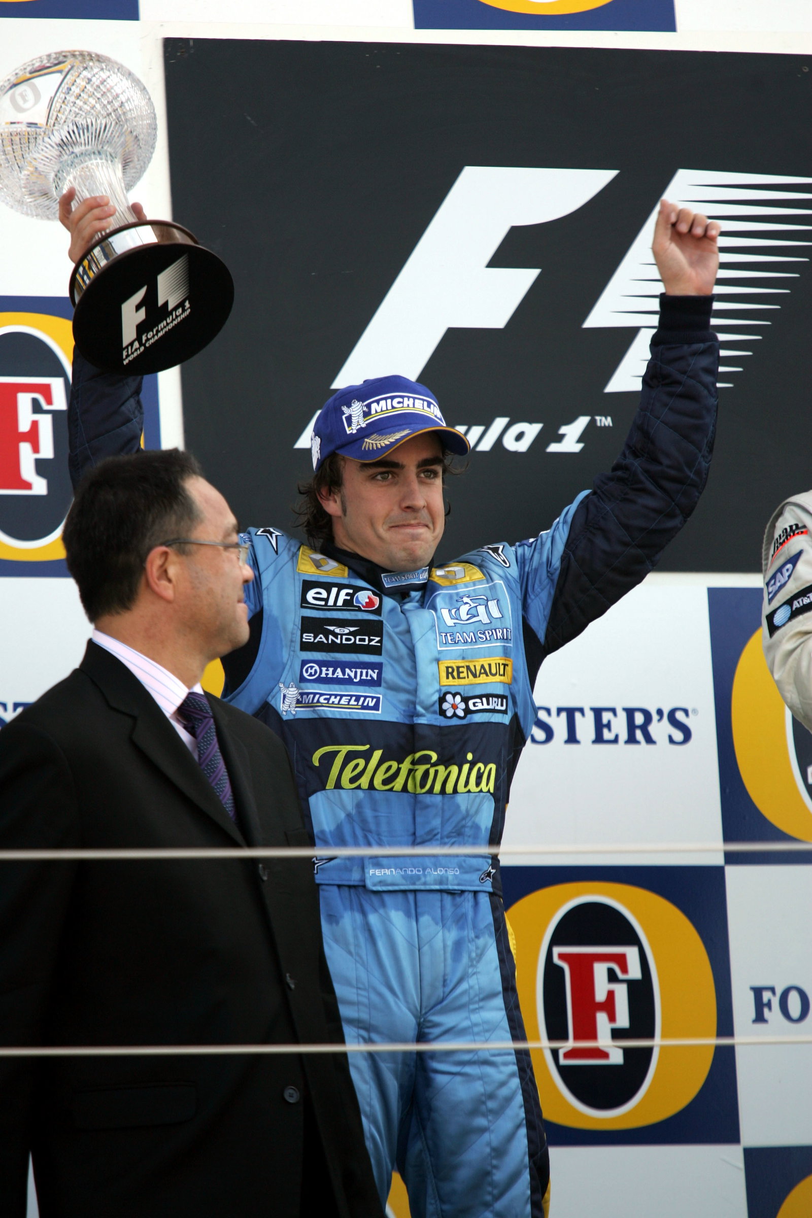 Fernando Alonso celebrates after finishing second at the British GP