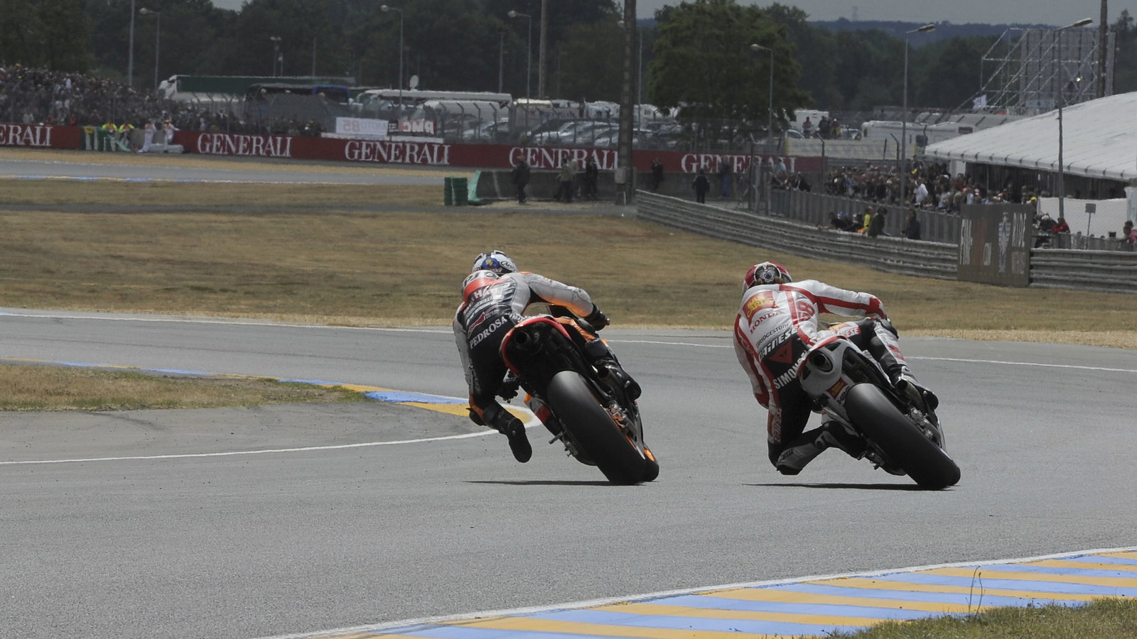 Simoncelli, Pedrosa, French MotoGP Race 2011
