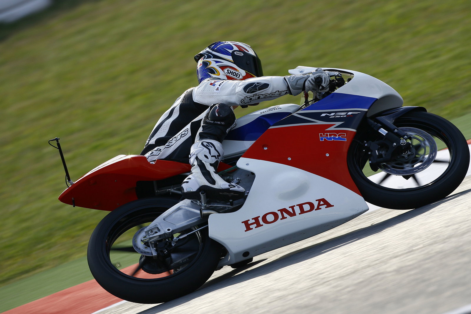 Criville riding the Honda Moto3, Catalunya MotoGP 2011